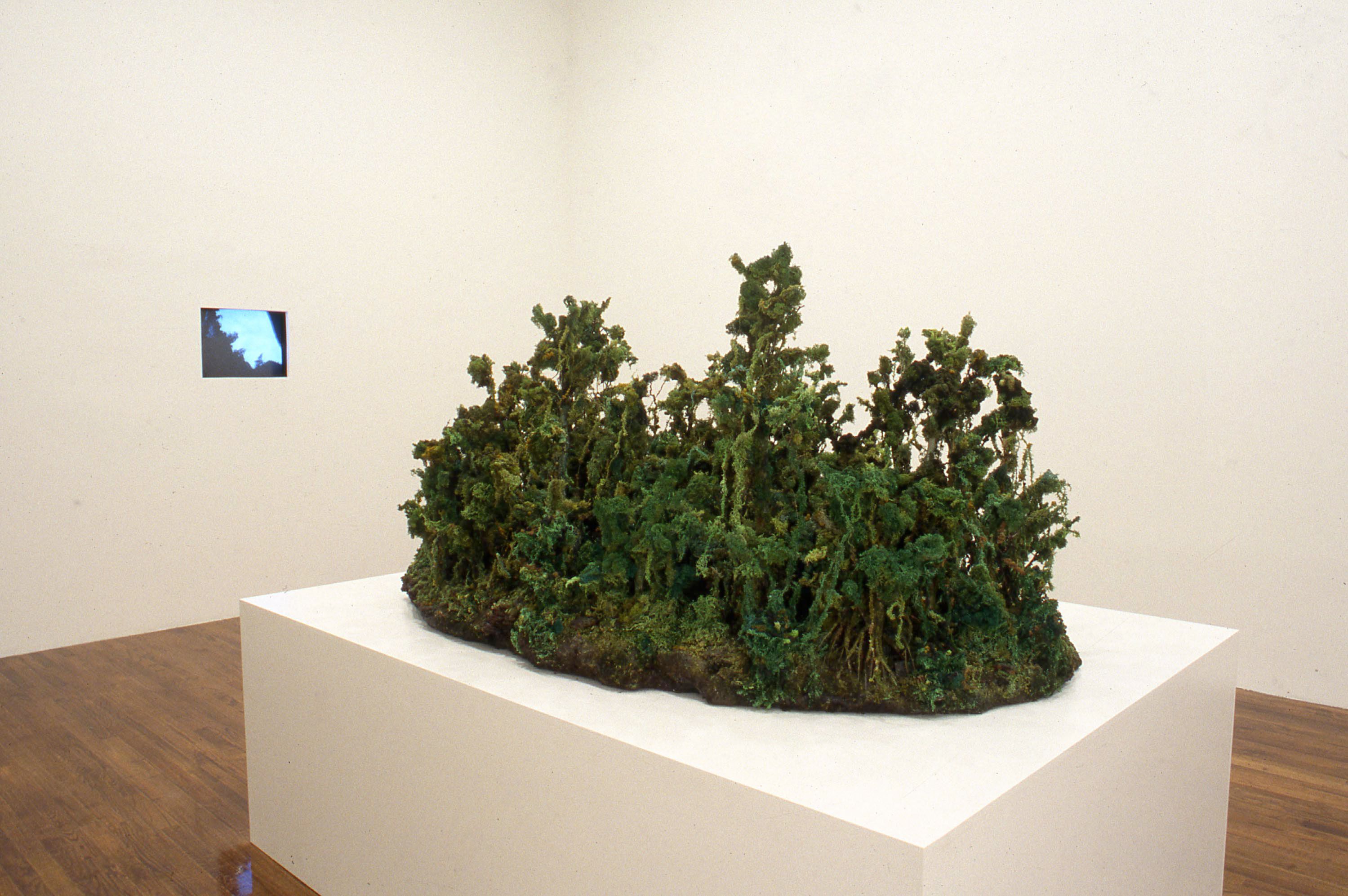 A sculpture by Yutaka Sone, titled Green Jungle, dated 1999.
