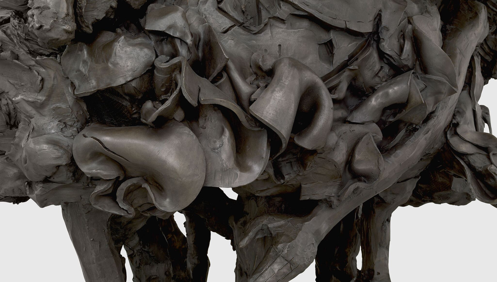A detail of a sculpture by Dana Schutz, titled Sea Group, dated 2022