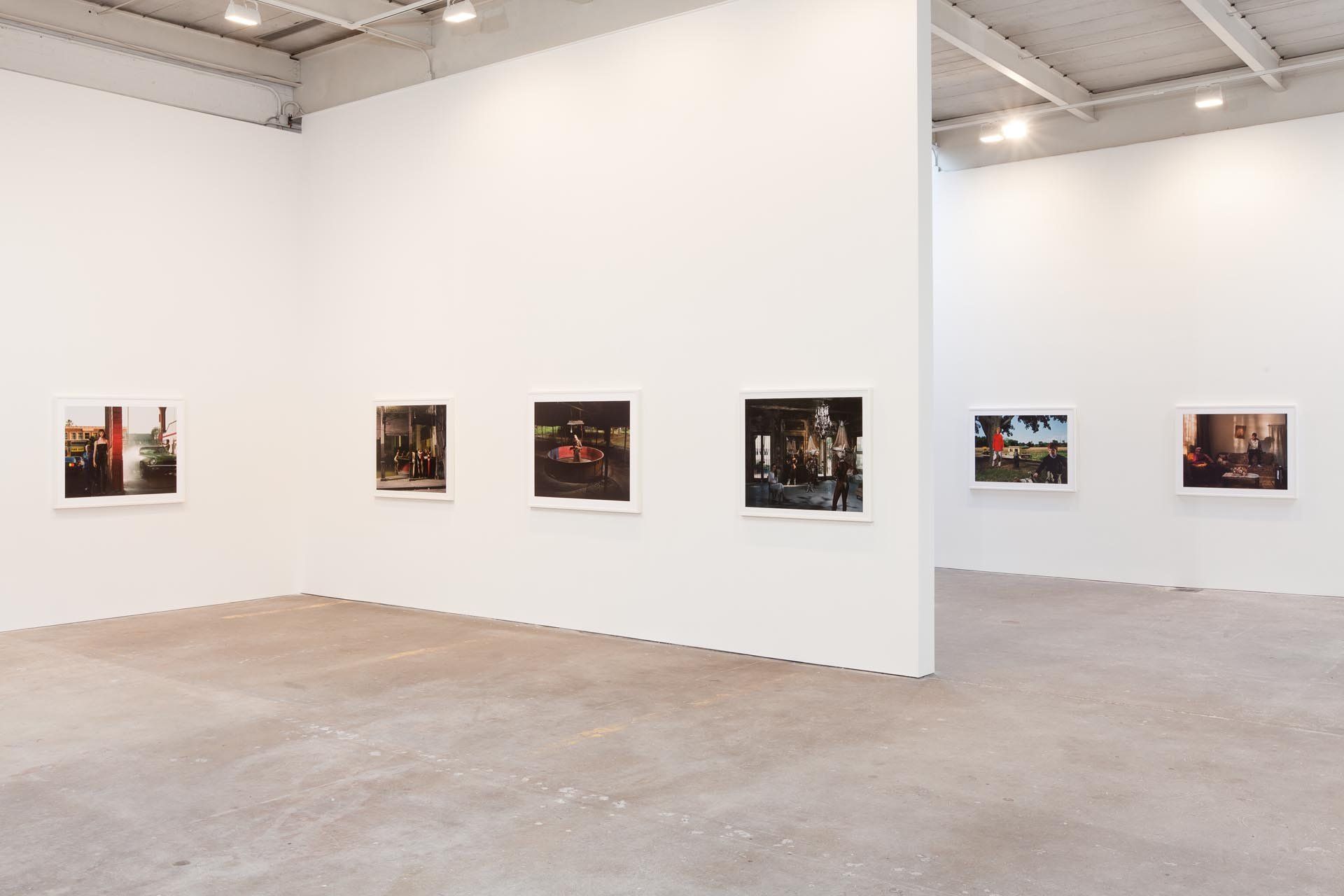 Installation view of the exhibition Philip-Lorca diCorcia: ELEVEN at David Zwirner in New York, dated 2011.