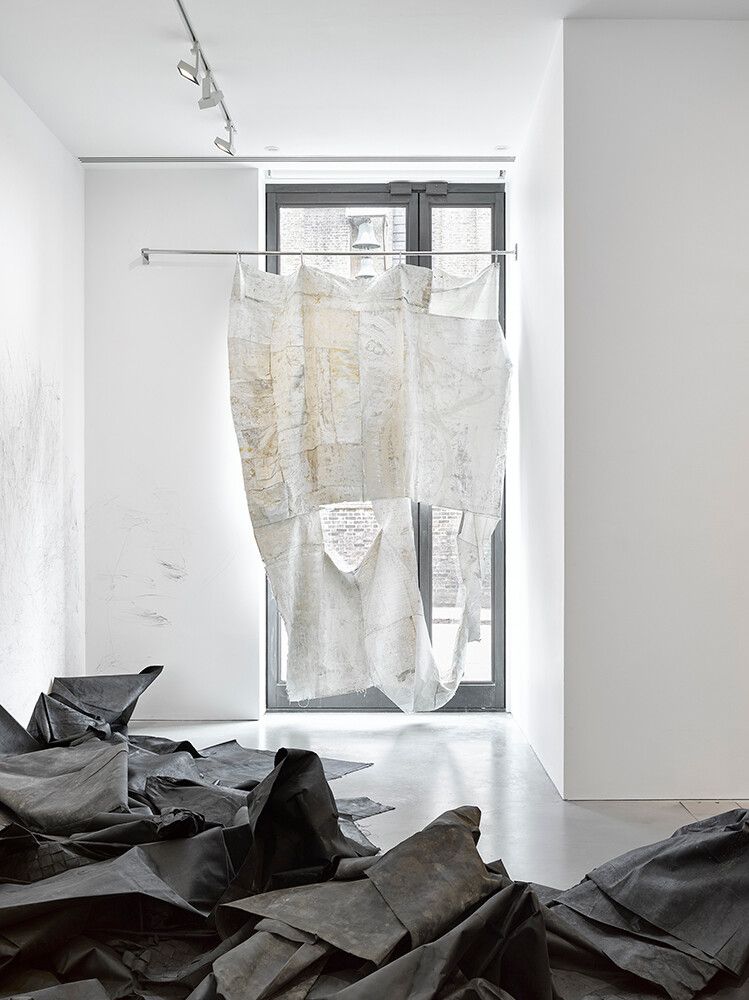 An installation view featuring works by Oscar Murillo, dated 2019