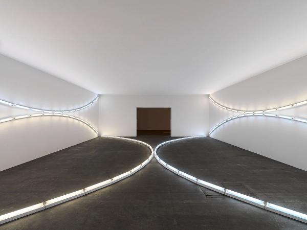 Dan Flavin — three sets of tangented arcs in daylight and cool white (to Jenny and Ira Licht)