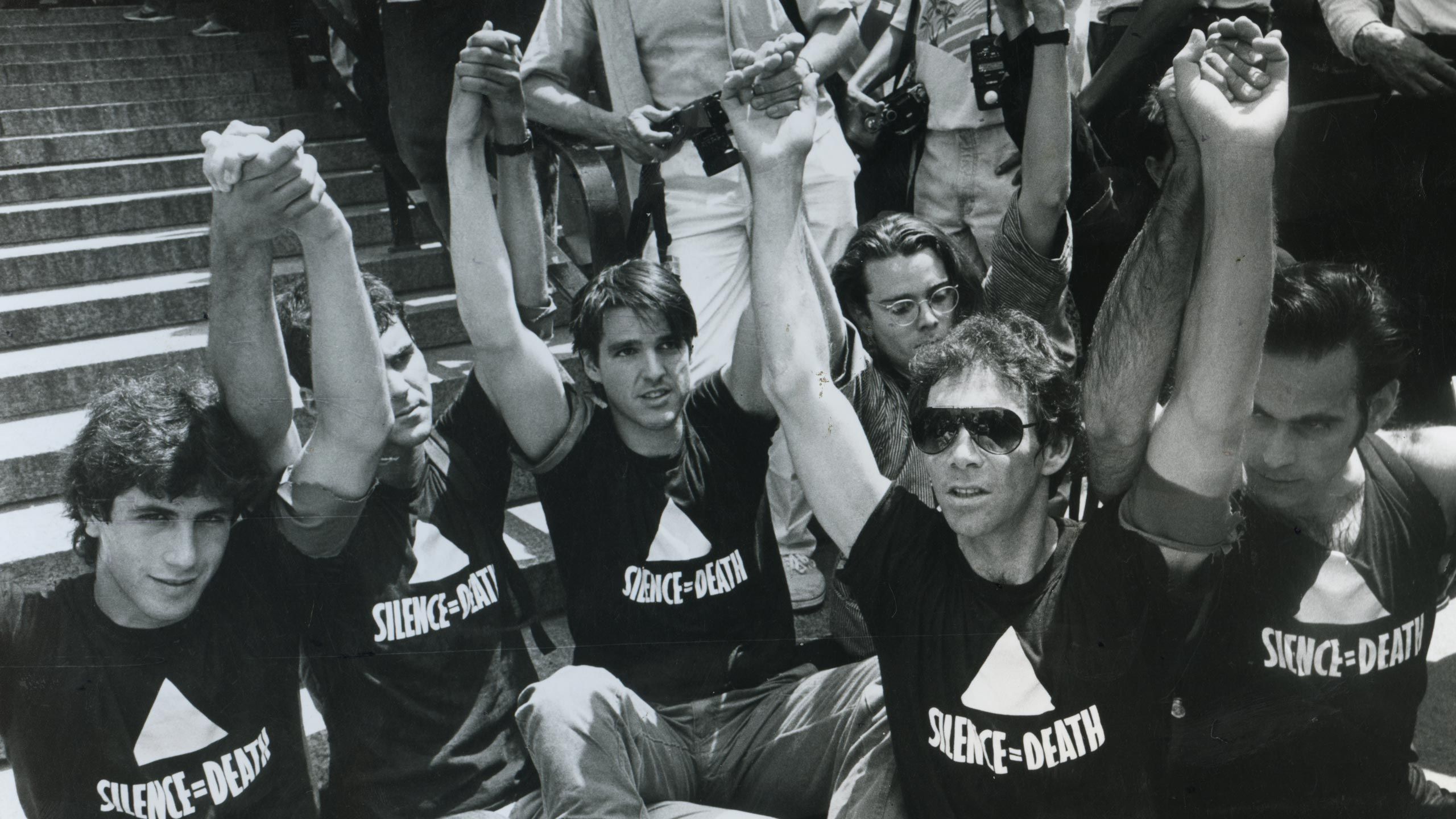 A photo of members of the Silence=Death Collective at a demonstration together in 1987.