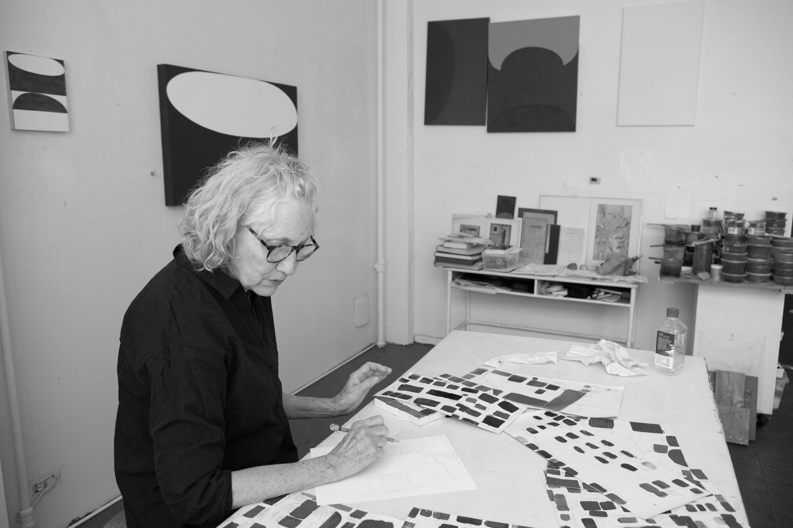 A photograph of Suzan Frecon in her studio, dated 2015