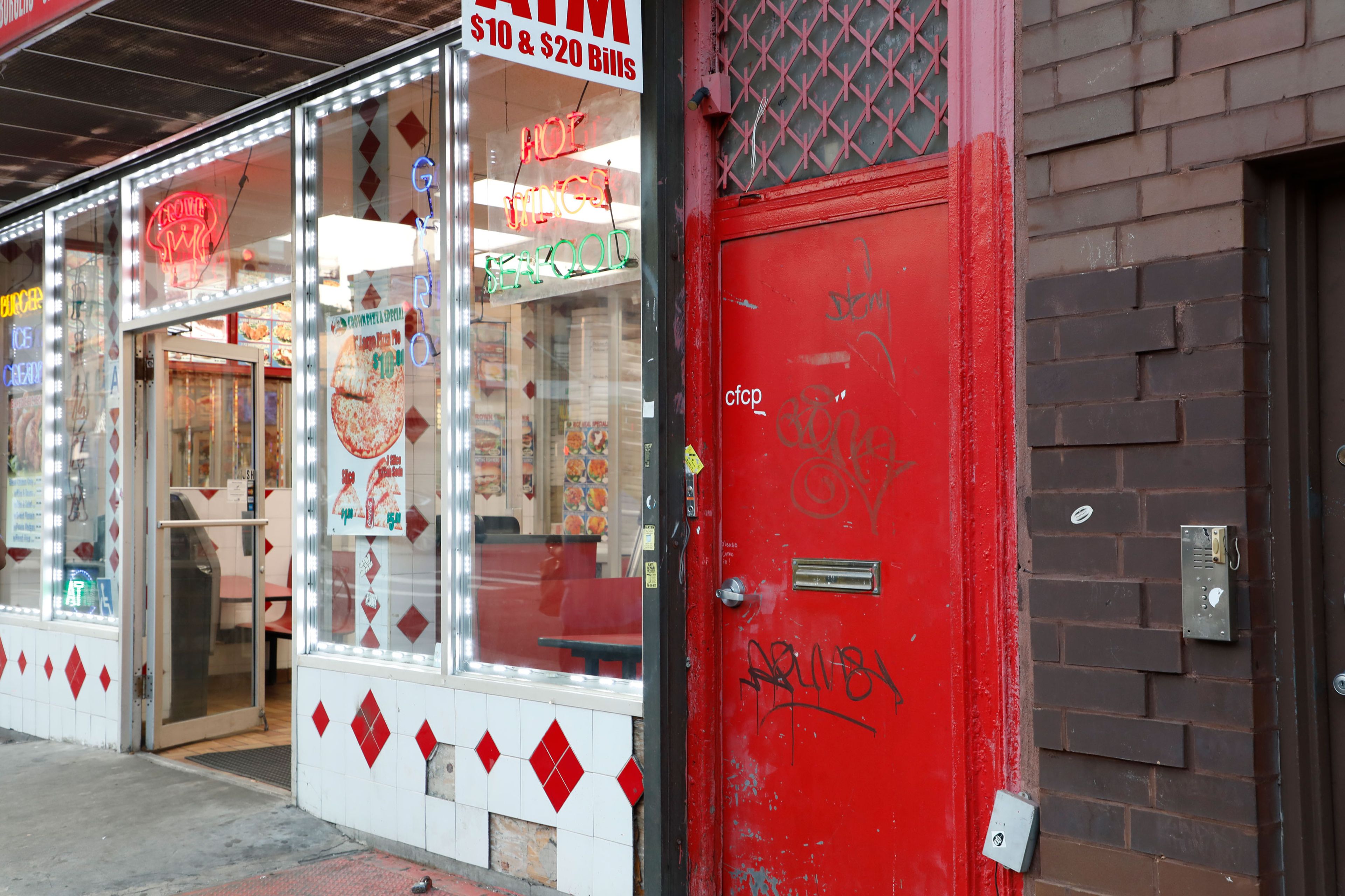 A photograph of the front door of cfcp, New York. dated 2019.