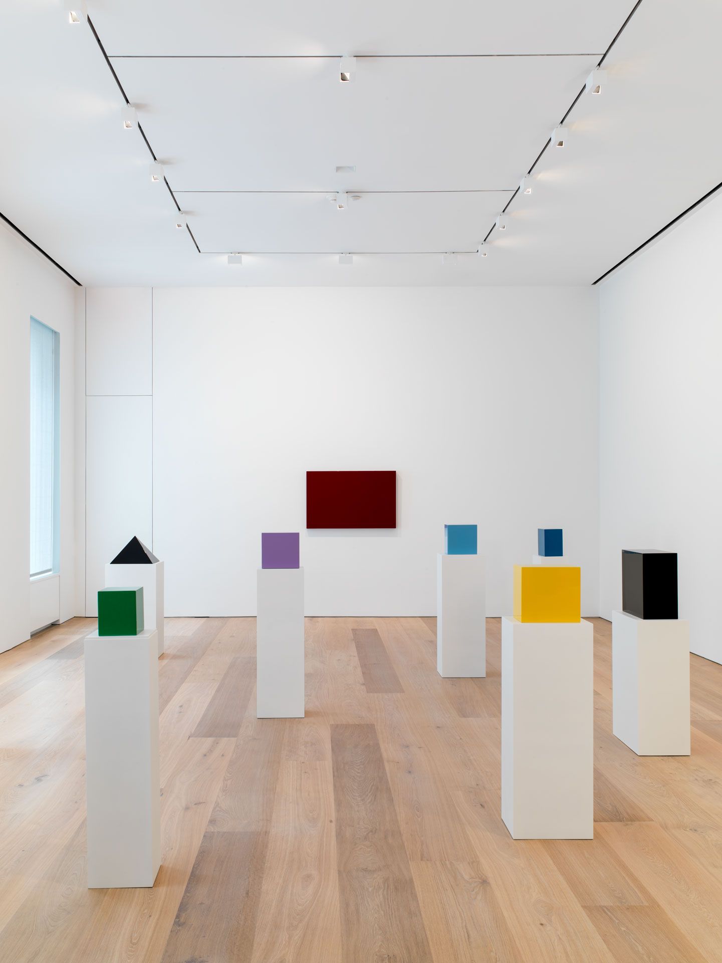 An installation view featuring works by John McCracken, dated 2013