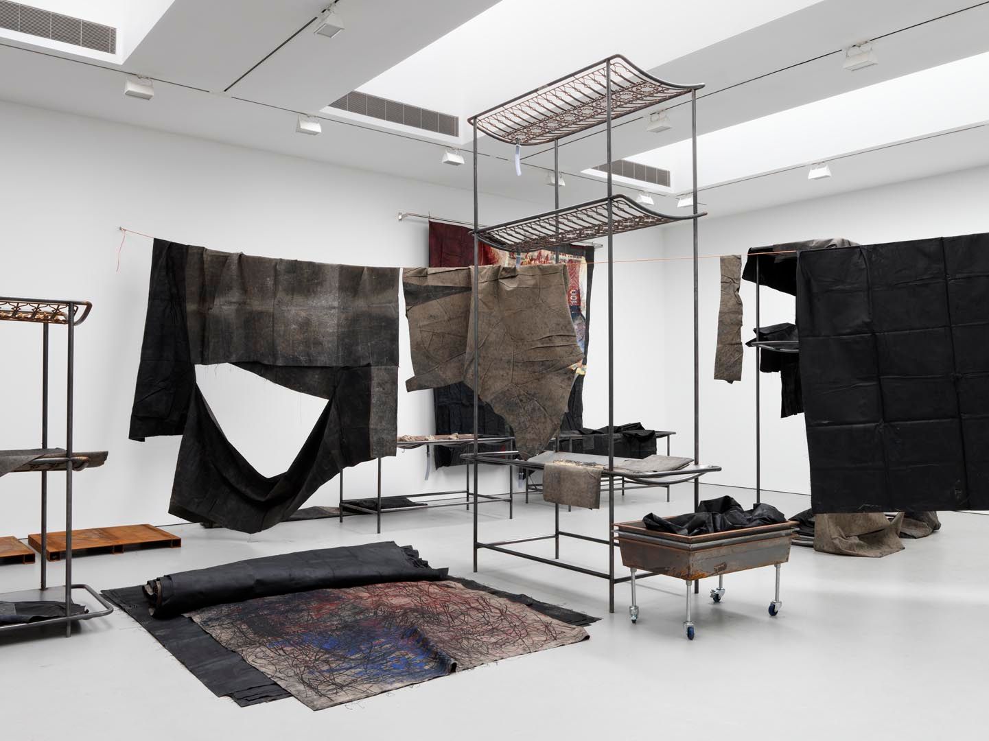 An installation view of the exhibition Oscar Murillo: through patches or corn, wheat and mud, at David Zwirner New York, date 2016..