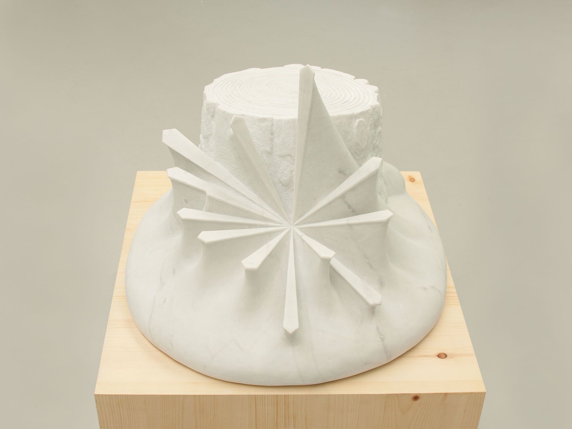 A marble sculpture by Yutaka Sone, titled Light in between Trees #3 (tree trunk), dated 2010. 