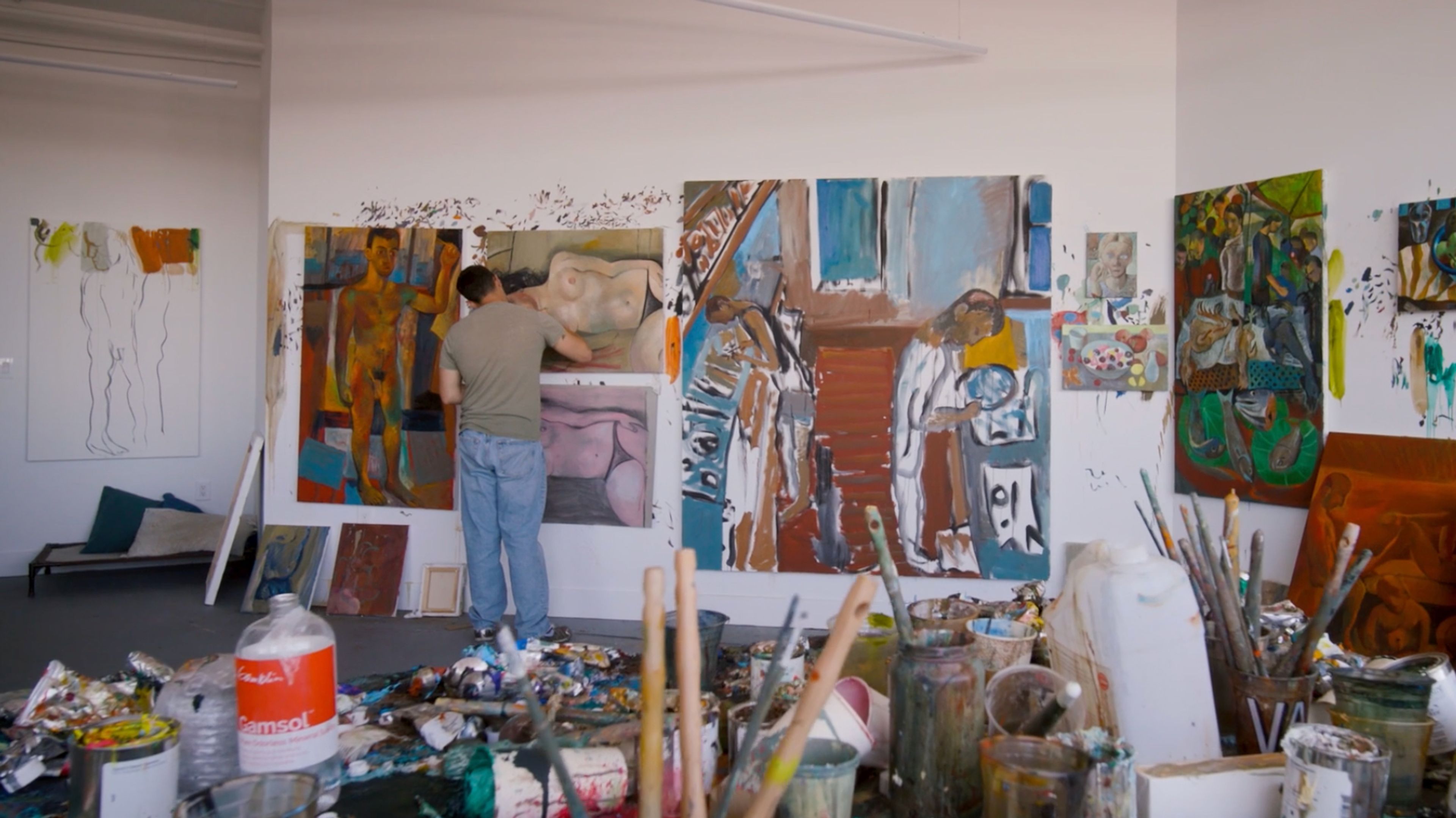 A photo of Louis Fratino in his studio by the Louisiana Channel