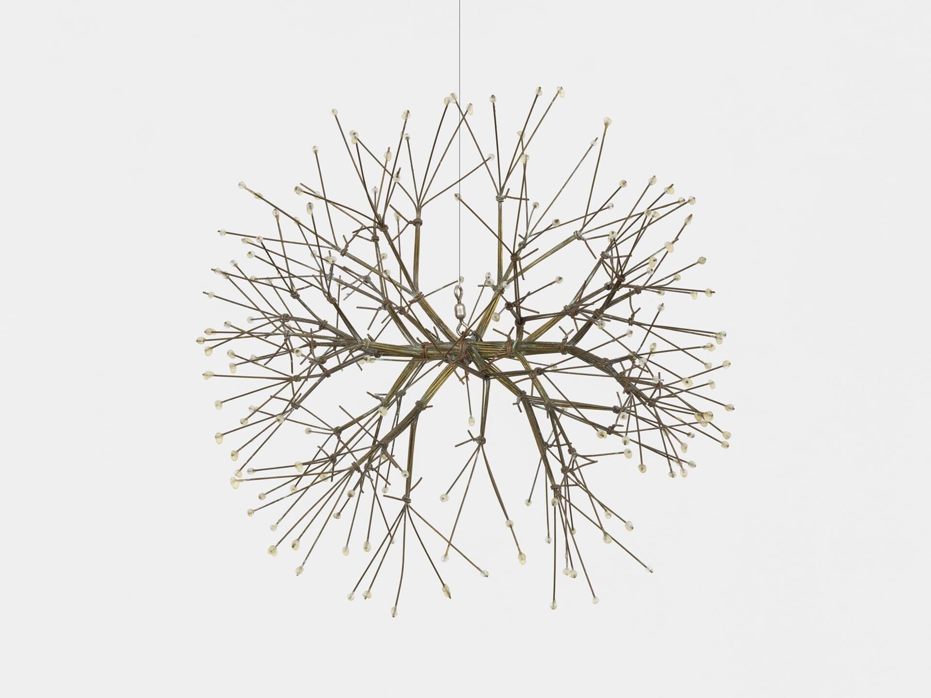 A sculpture by Ruth Asawa, titled Untitled (S.479, Hanging Tied Wire, Closed Center Double Sided Multibranched Form Based on Nature), dated 1963.
