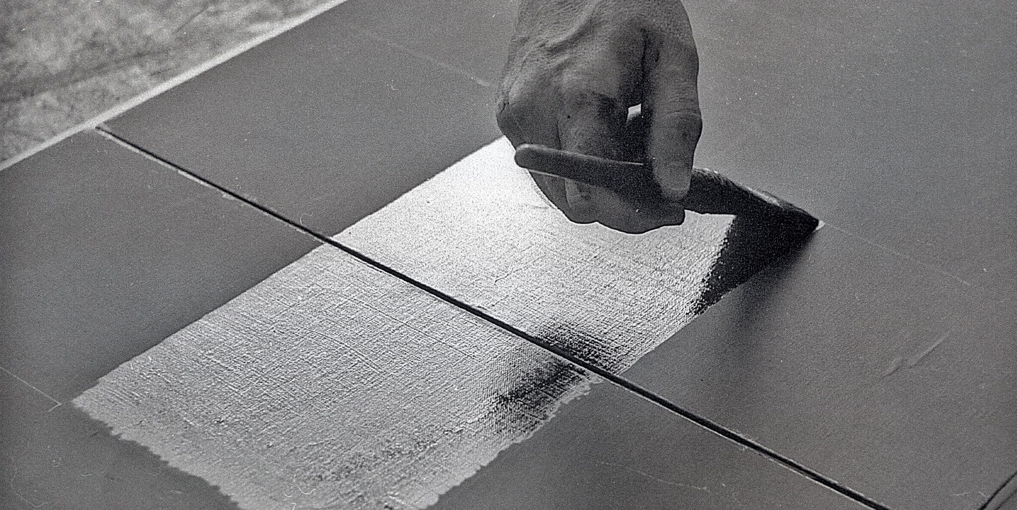 A photo of Ad Reinhardt in his studio in 1966. Photo by John Loengard.