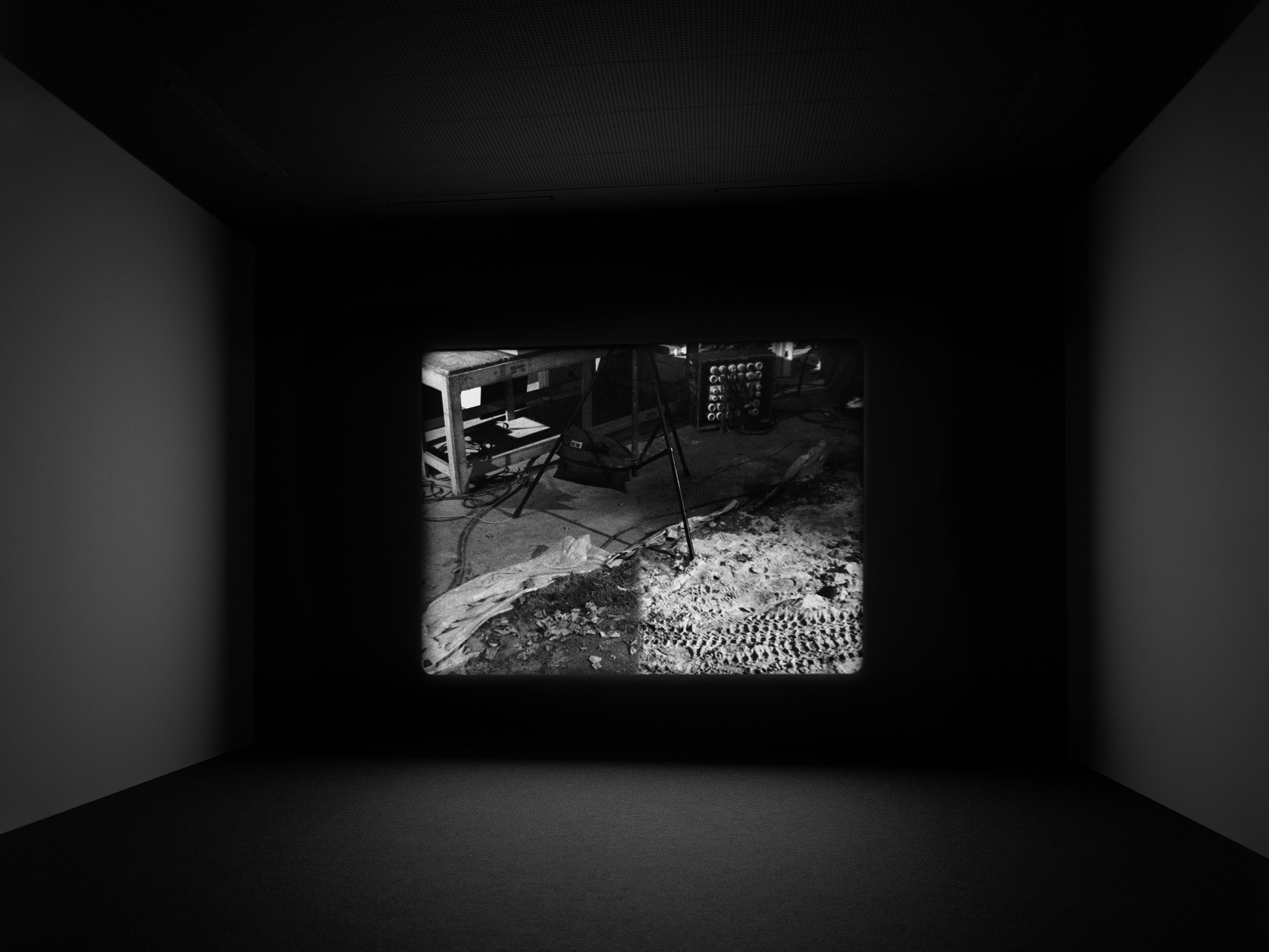 A film installation by Stan Douglas, titled Der Sandmann, dated 1995.