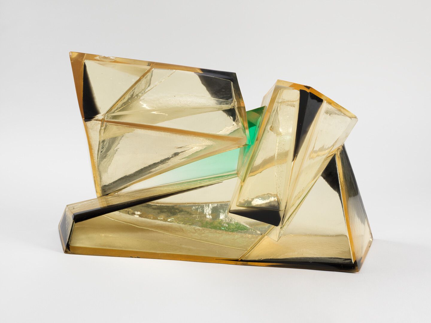 A polyester resin sculpture by Leo Amino, titled, Refractional #59 (Three Piece Unit), dated 1970.