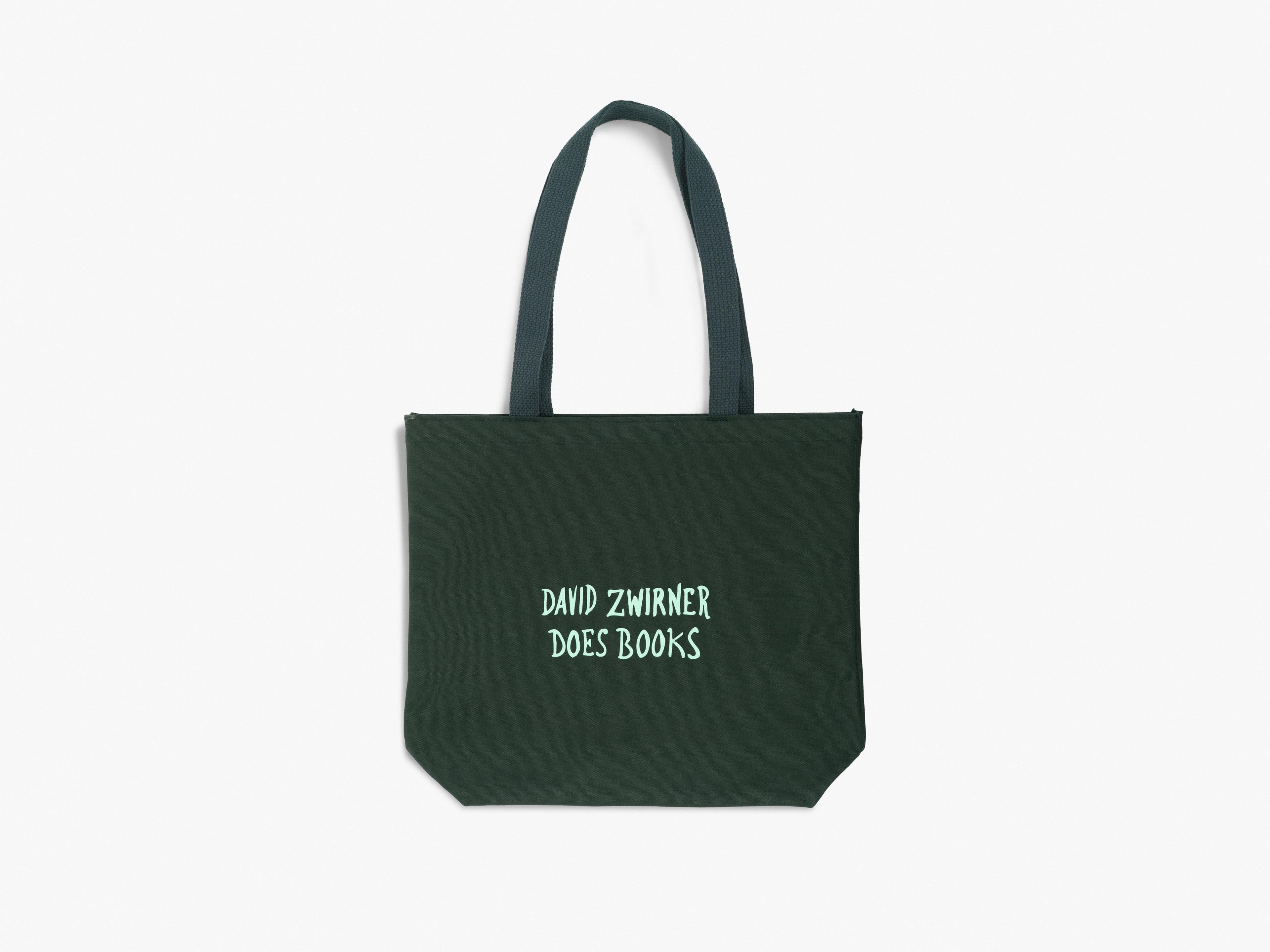 A heavy-duty cotton canvas tote in hunter green, featuring screenprinted handwriting by Marcel Dzama reading "David Zwirner Does Books"