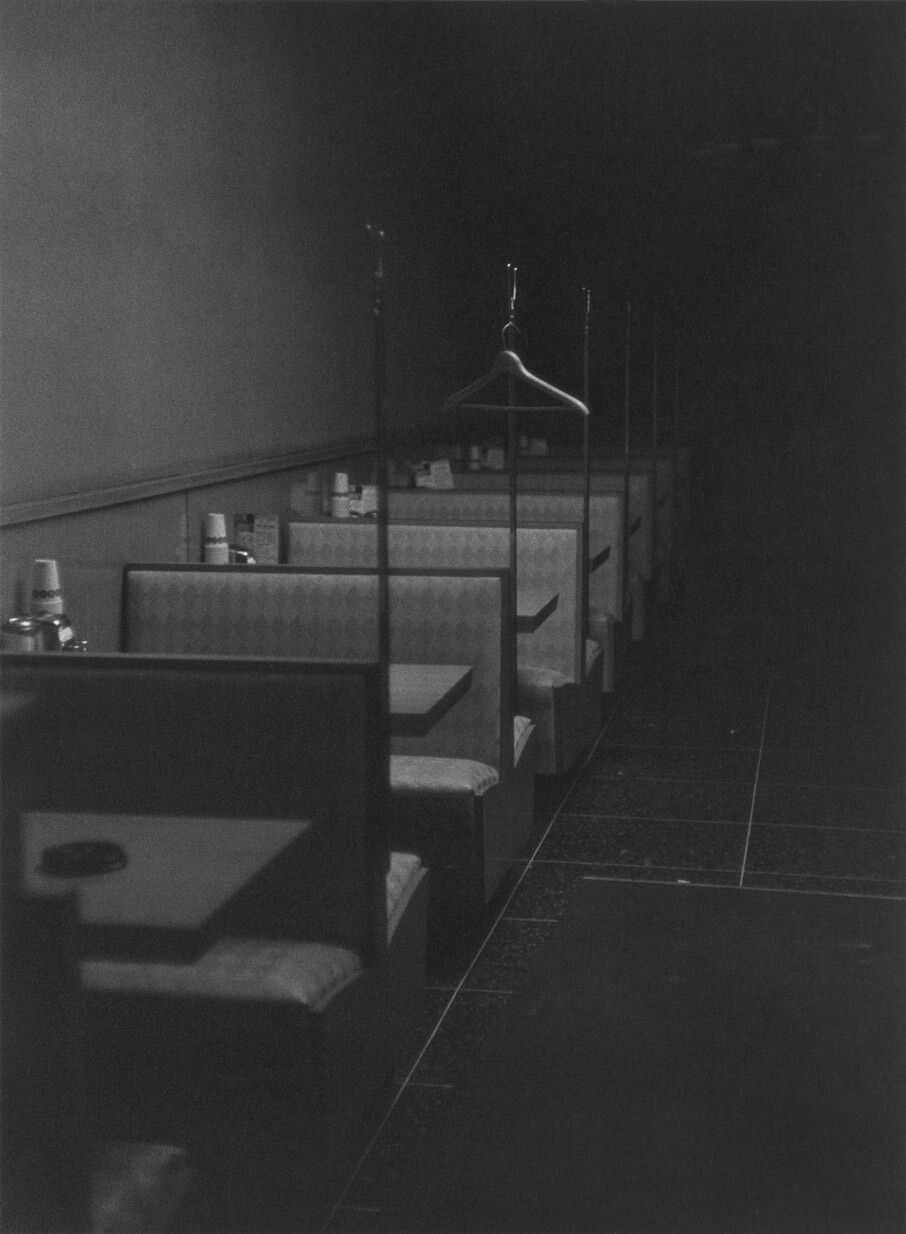 A silver gelatin print by Roy DeCarava, titled Coathanger, dated 1961.
