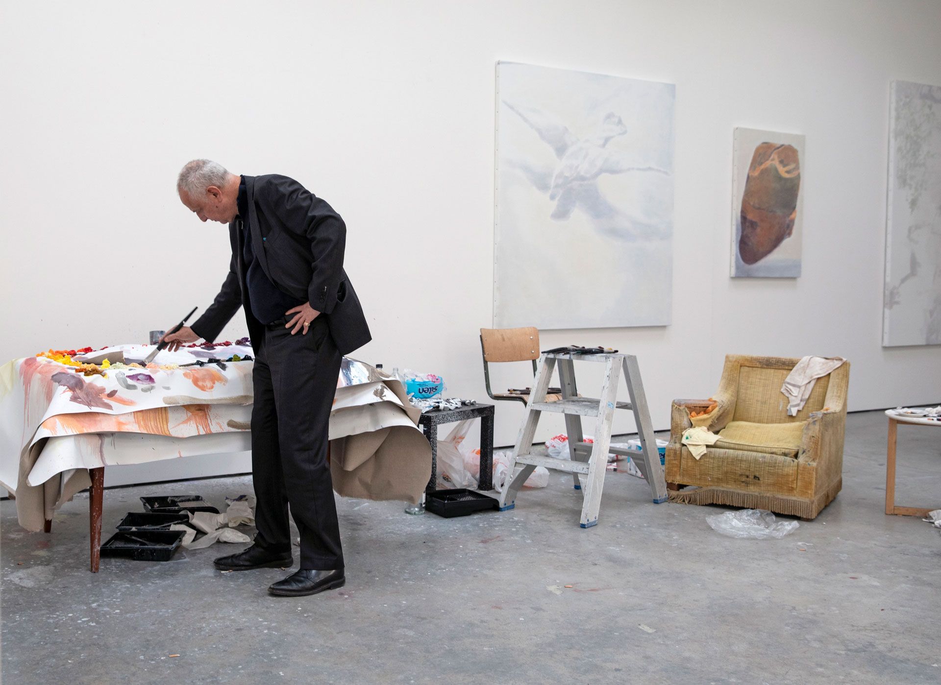 A photograph of Luc Tuymans in his studio, dated 2019