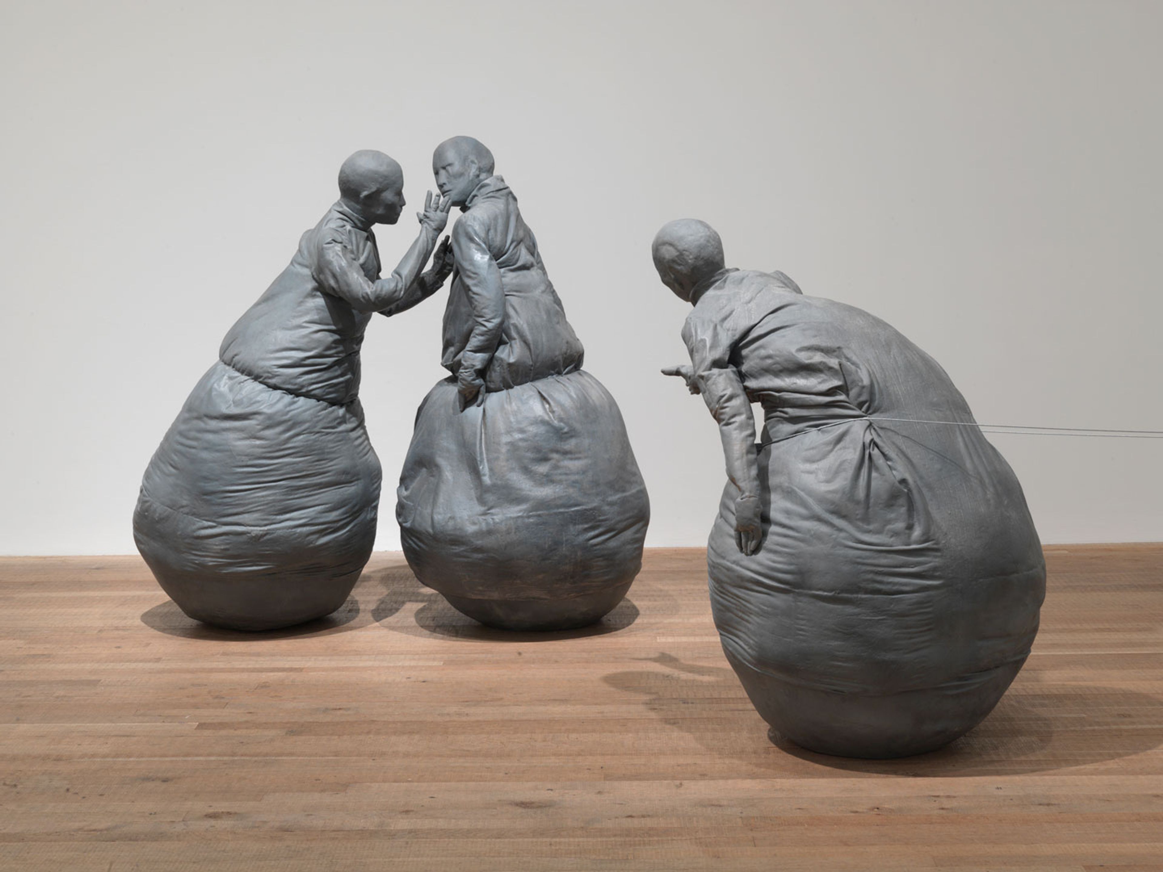 A mixed media sculptural installation by Juan Munoz, titled Conversation Piece, dated 1996, at Tate Modern, in London, England, in 2008. 