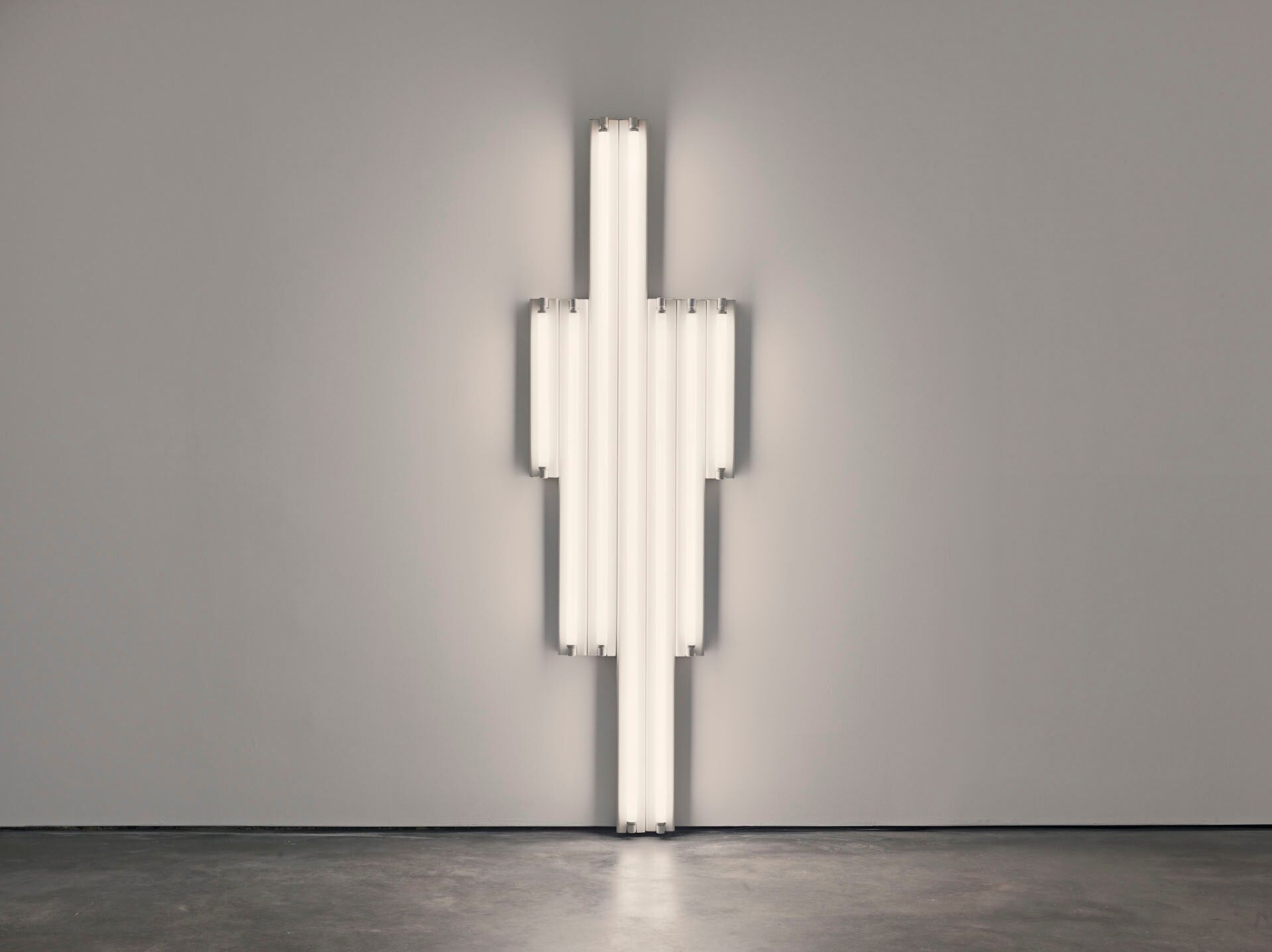 A sculpture by Dan Flavin, composed of cool white fluorescent light, titled "monument" for V. Tatlin, dated 1964.