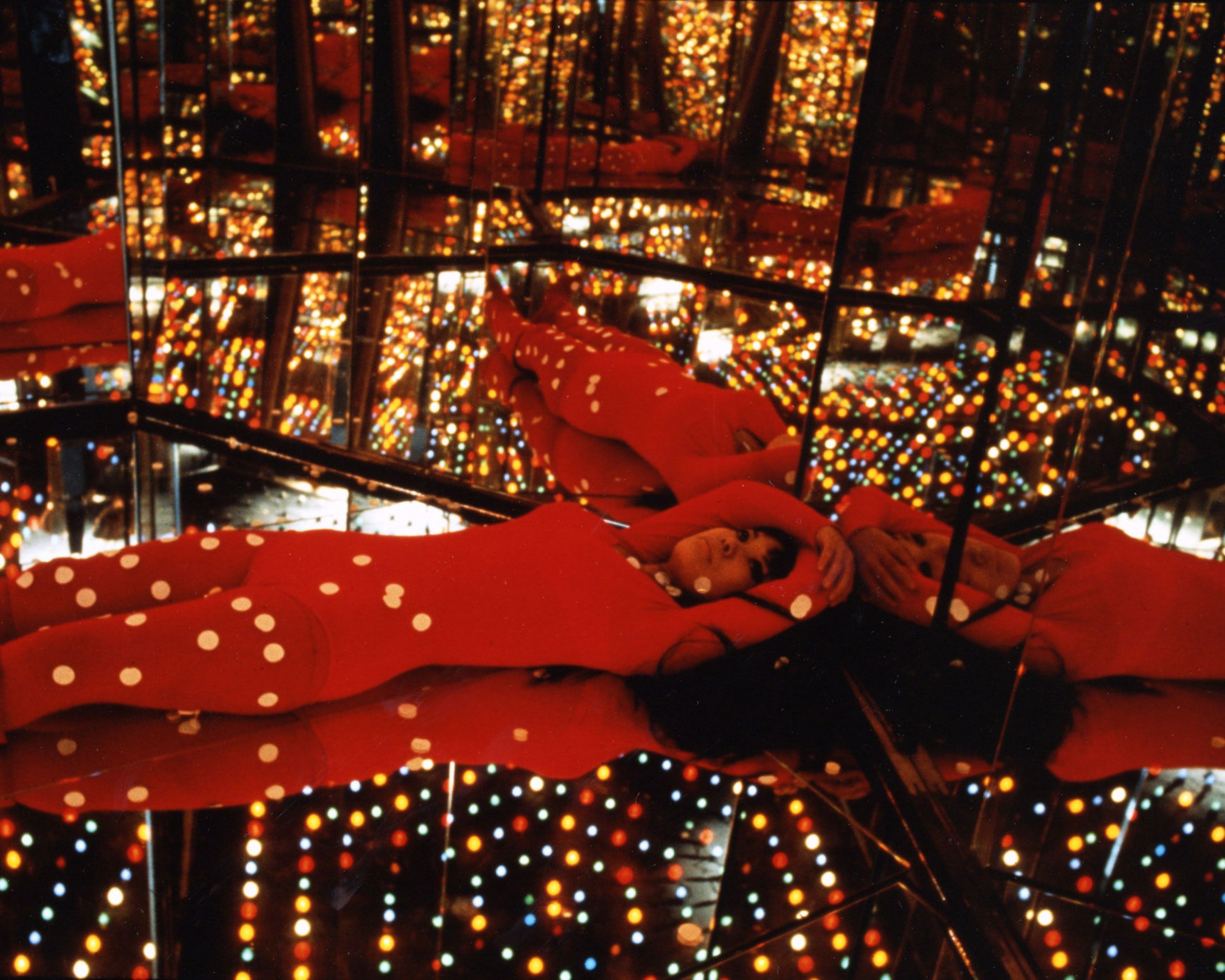 An installation view of the exhibition titled Peep Show or Endless Love Show by Yayoi Kusama at Castellane Gallery, New York in 1966