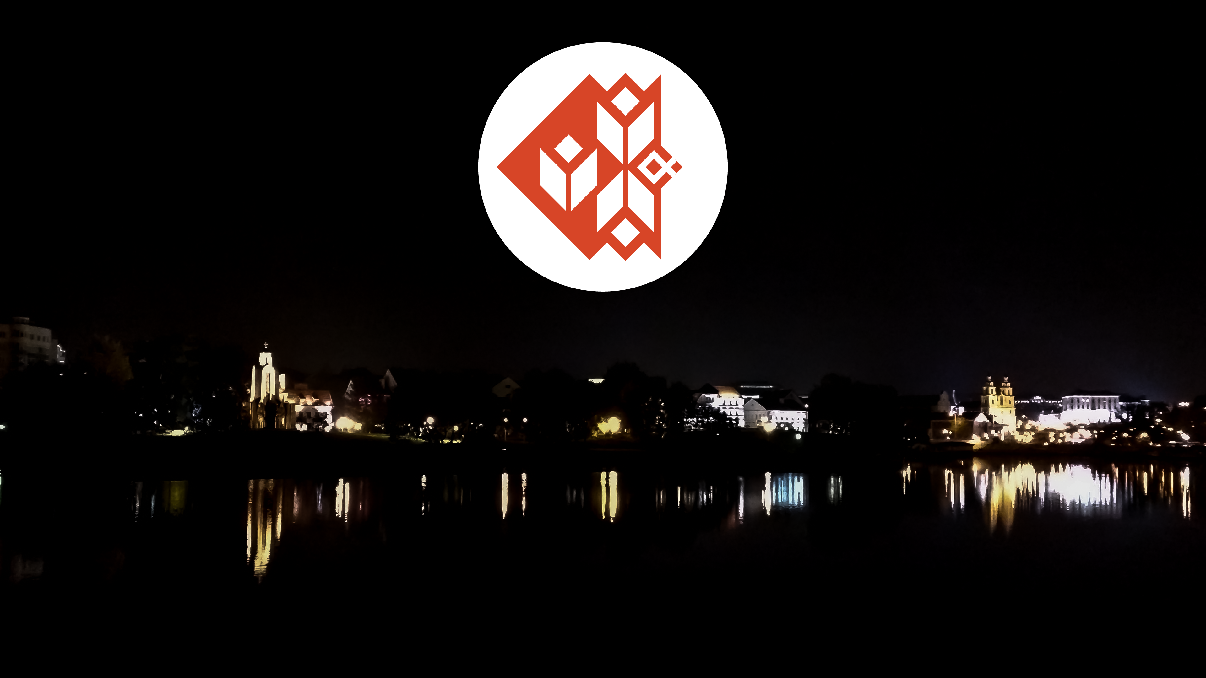 The UX Design Lab logo built from traditional Belarusian ornaments, whose forms hide the letters U, X and D.