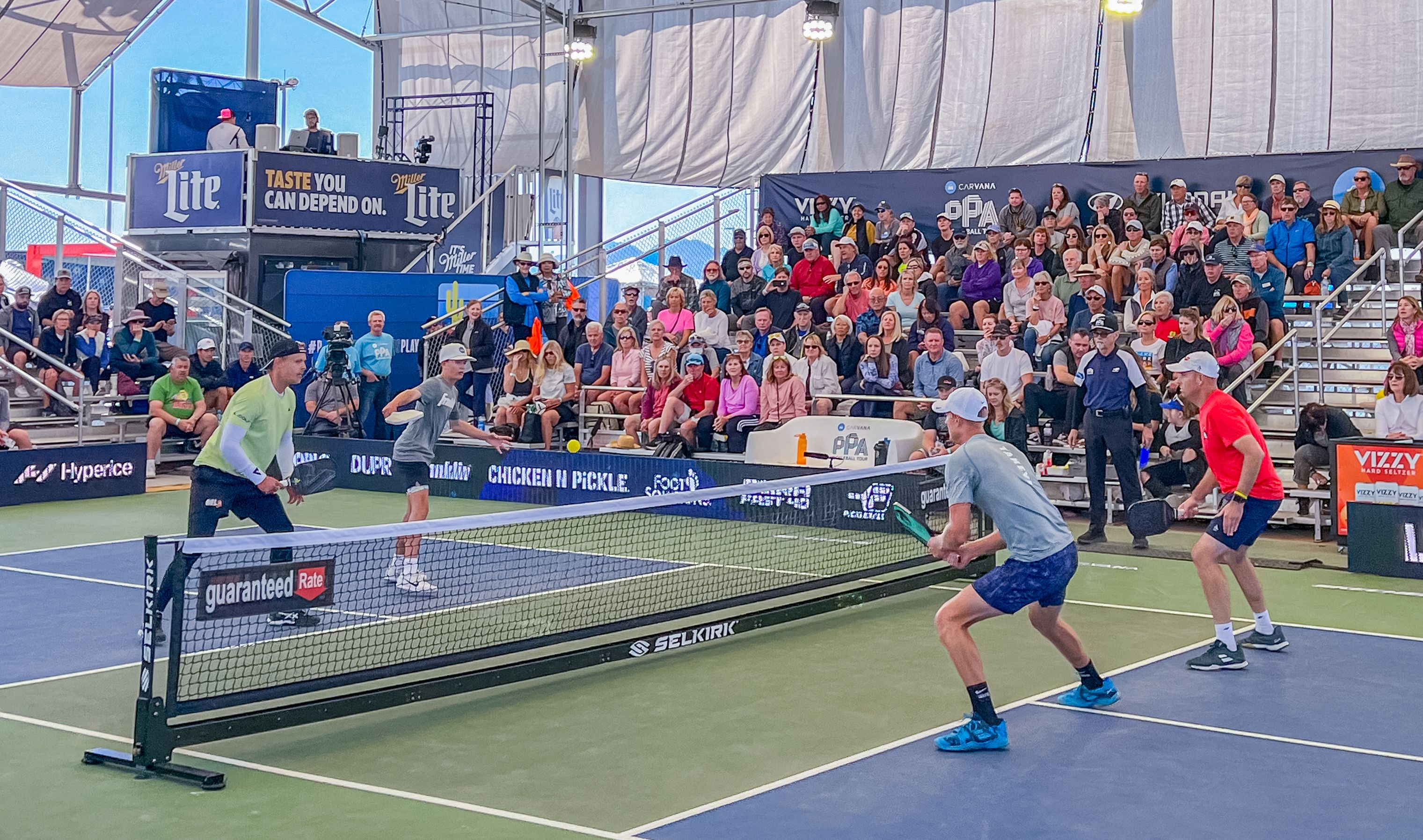 Players in a doubles pickleball game during the 2023 Arizona Grand Slam