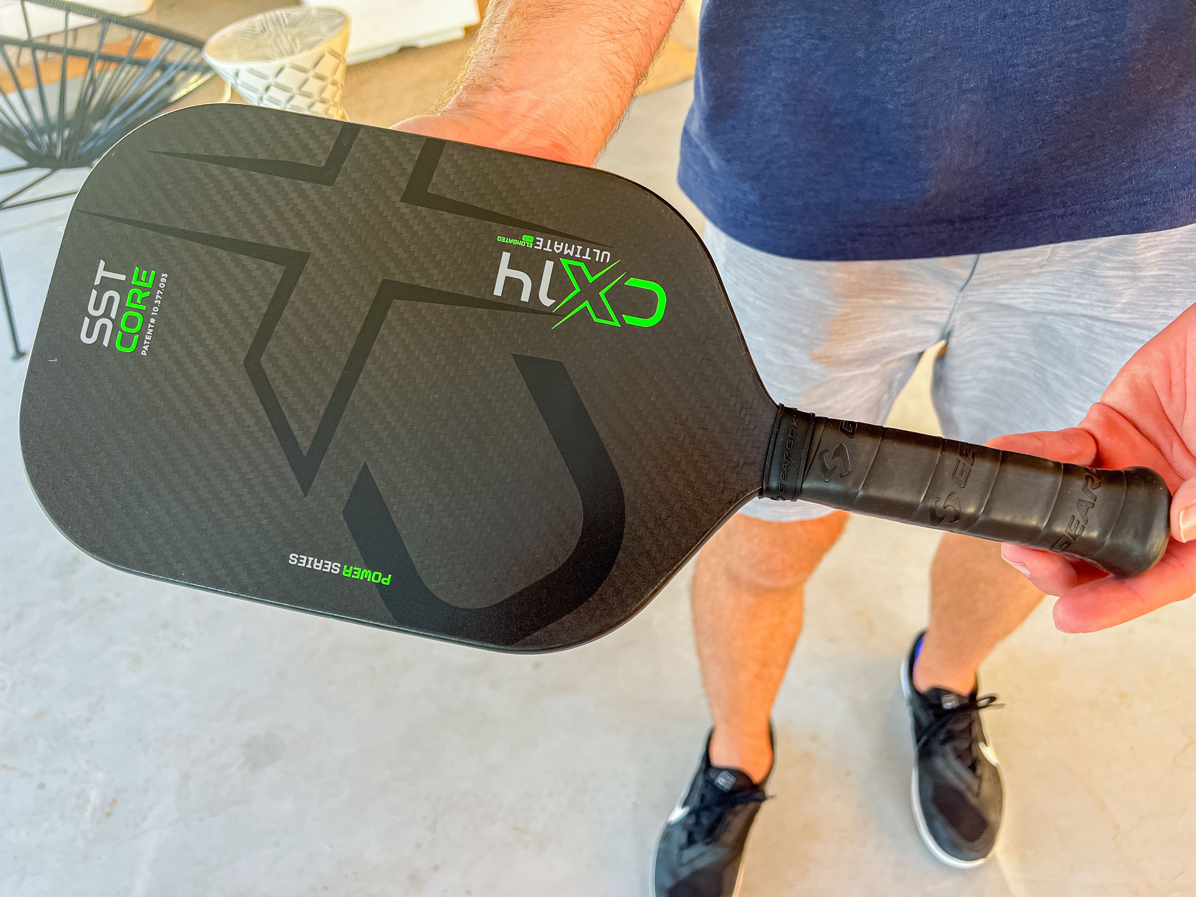 Brandon Mackie showing off the Gearbox CX14E Ultimate Power pickleball paddle