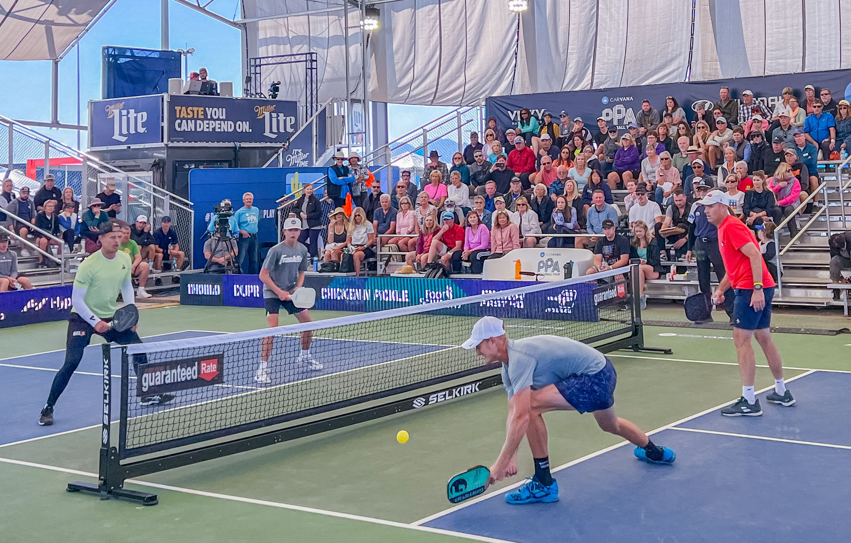 Players compete in a game of pickleball doubles at the Arizona Grand Slam