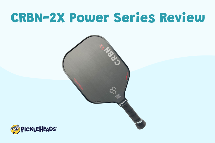 The CRBN-2X Power Series pickleball paddle on a blue background