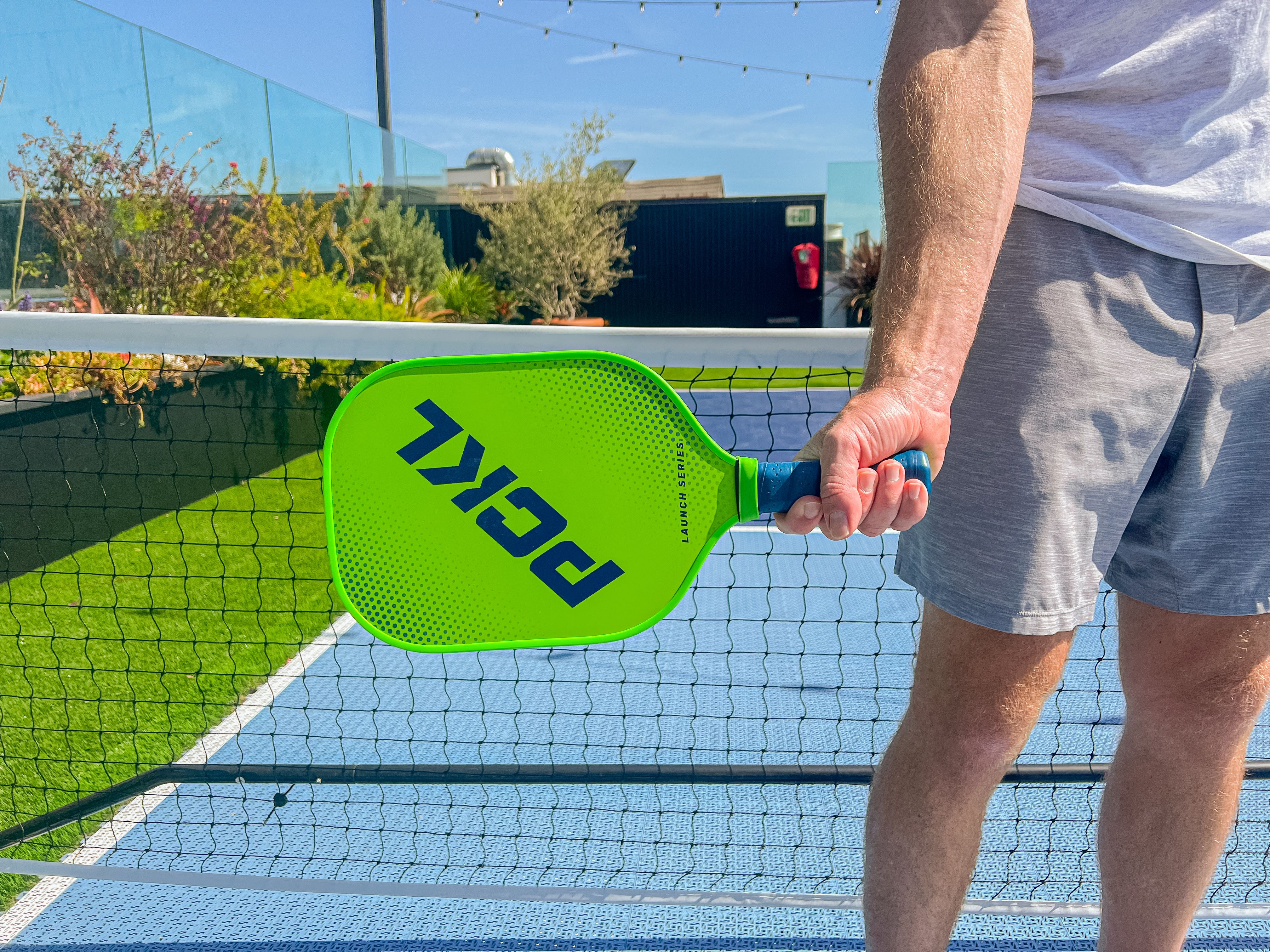 Brandon Mackie demonstrates a grip on the PCKL Launch Series pickleball paddle