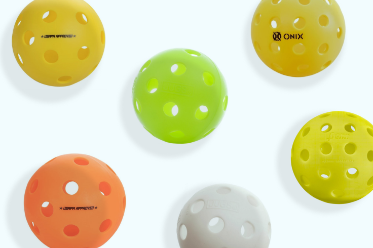 A selection of different colored pickleball balls