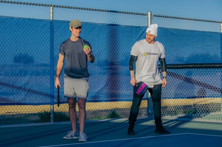 Pickleball players stacking for doubles