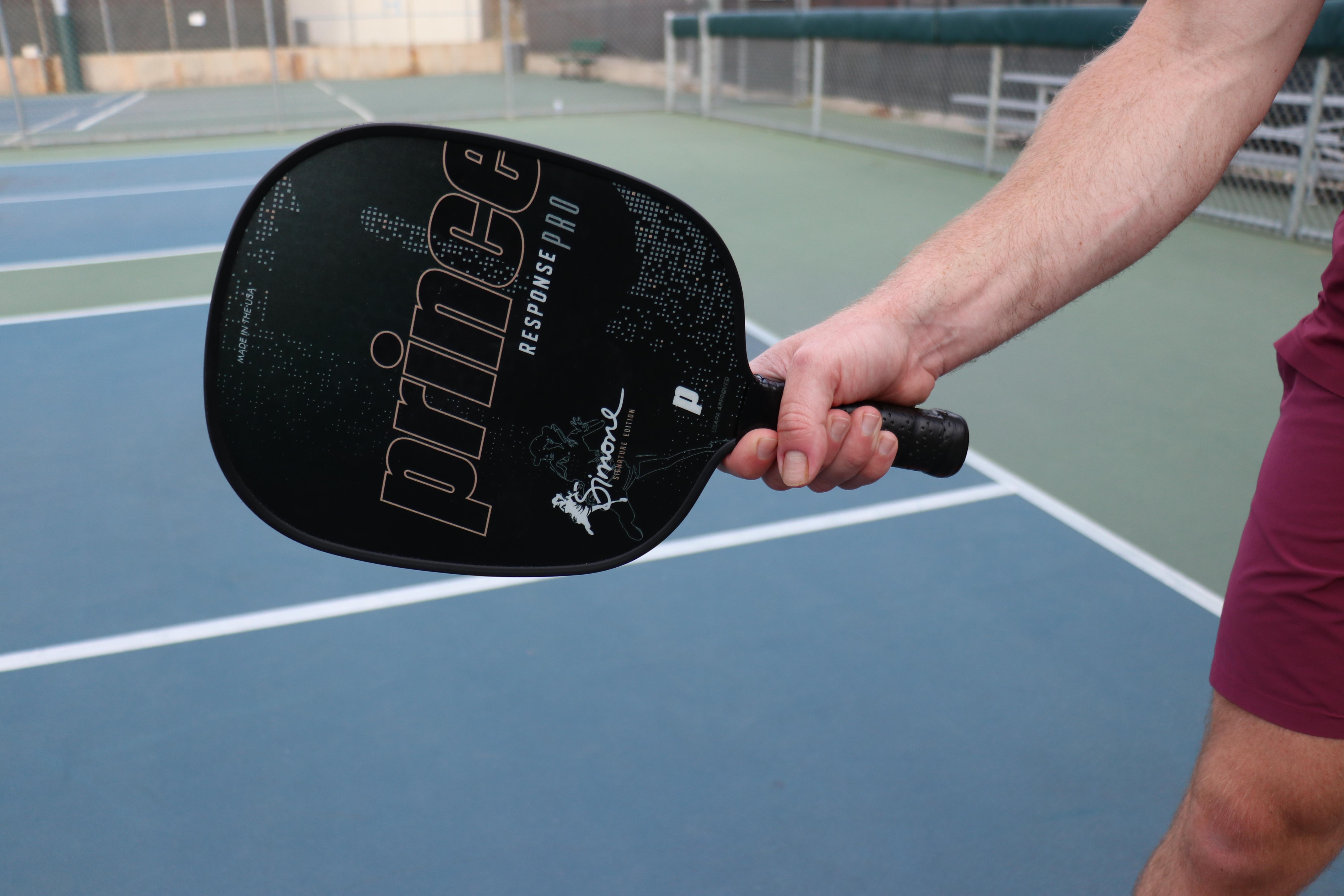 Player showing off their Prince Response Pro pickleball paddle