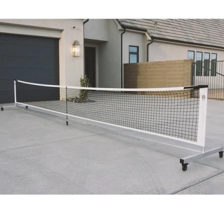 The Dominator Rolling Portable Pickleball Net fully assembled on a driveway