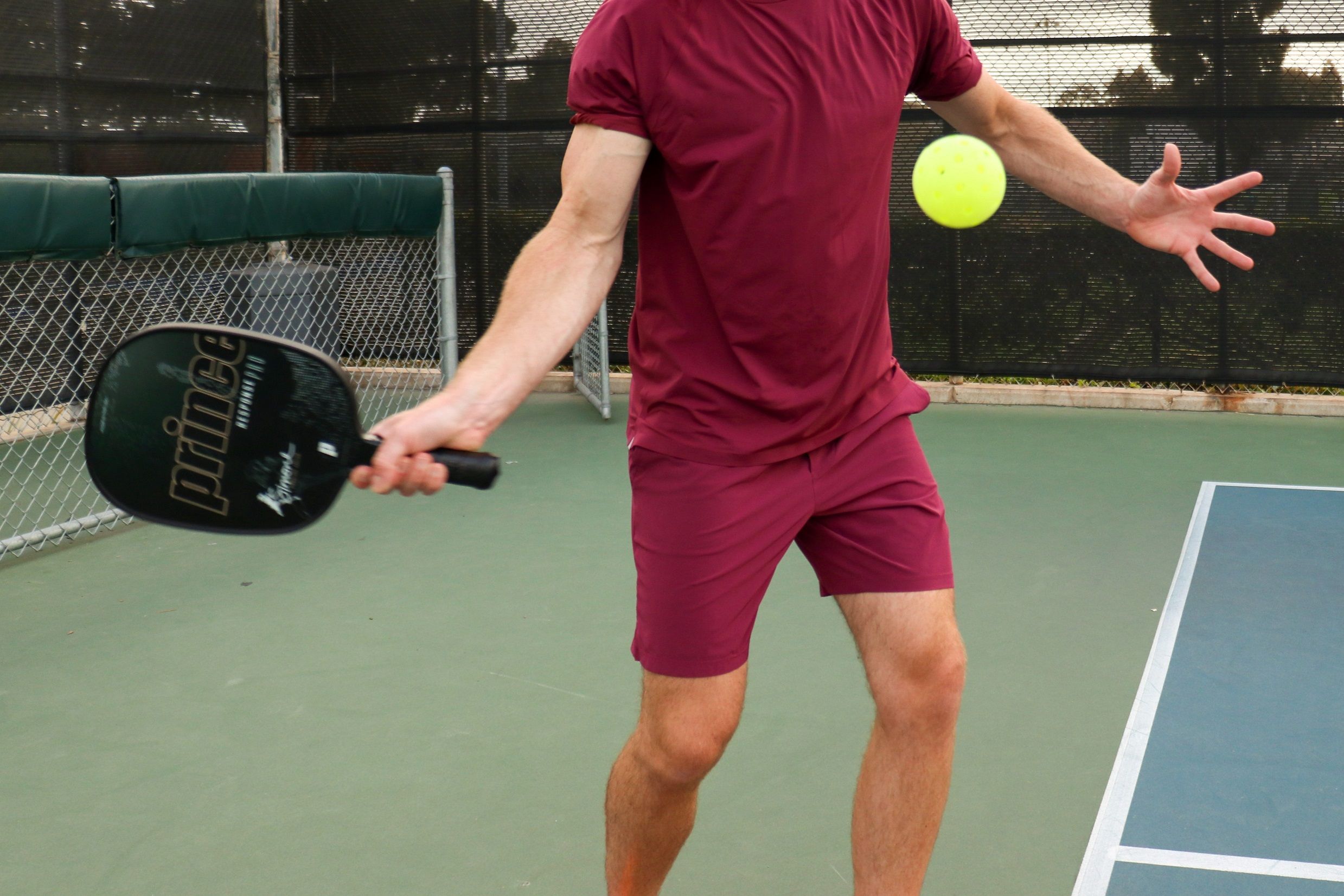 A Man Playing Pickleball in a Court