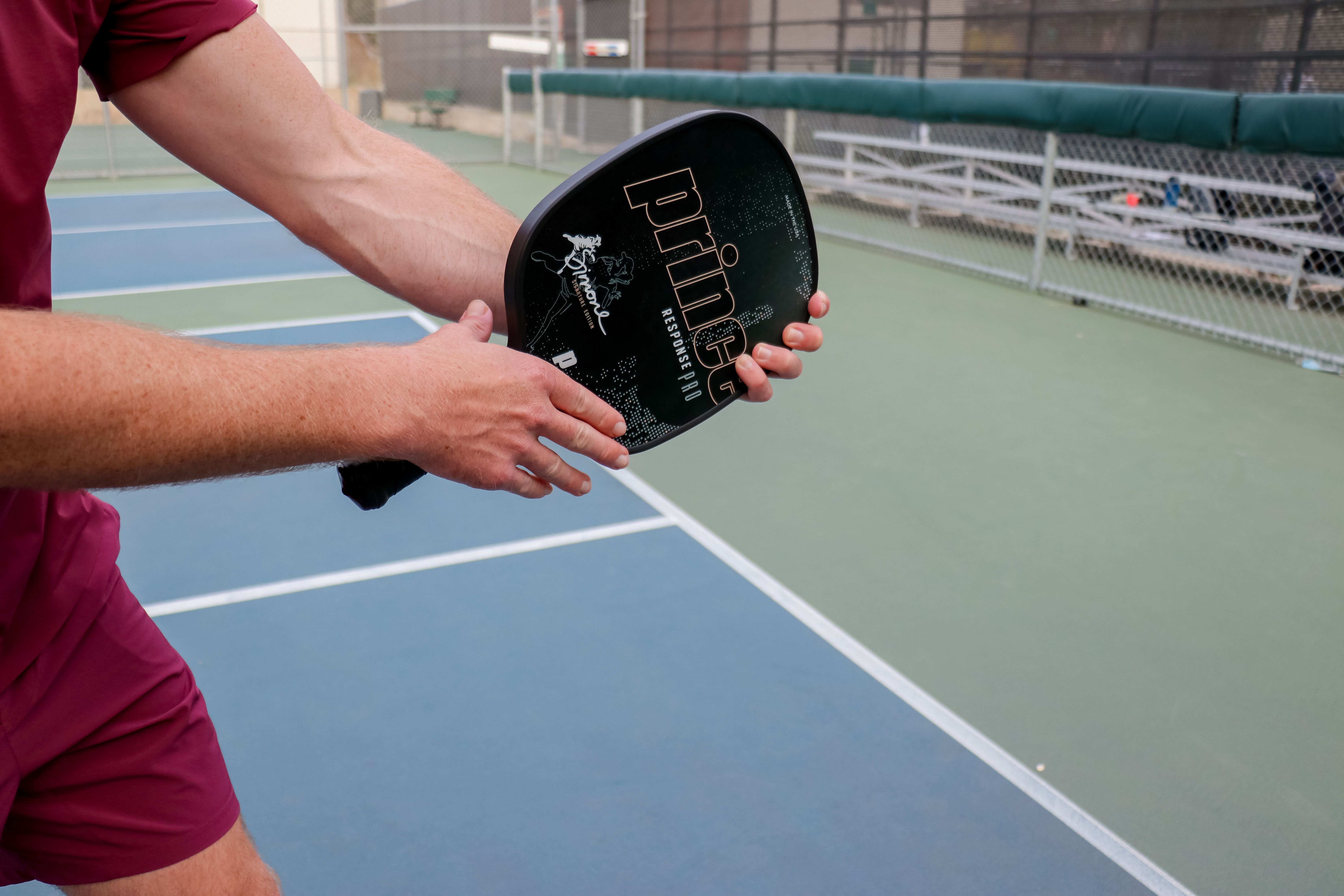 Player demonstrating paddle grip with the Prince Response Pro