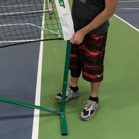 Image of the PickleNet Portable Pickleball Net System being assembled