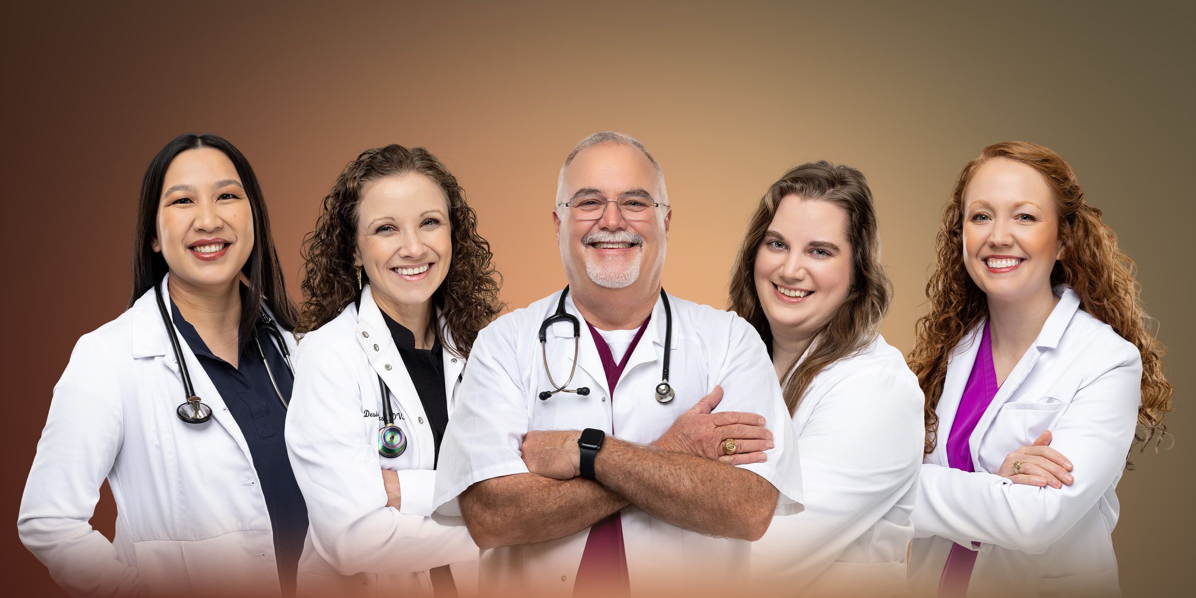 The five veterinarians of Sugar Land Pet Hospital in white coats