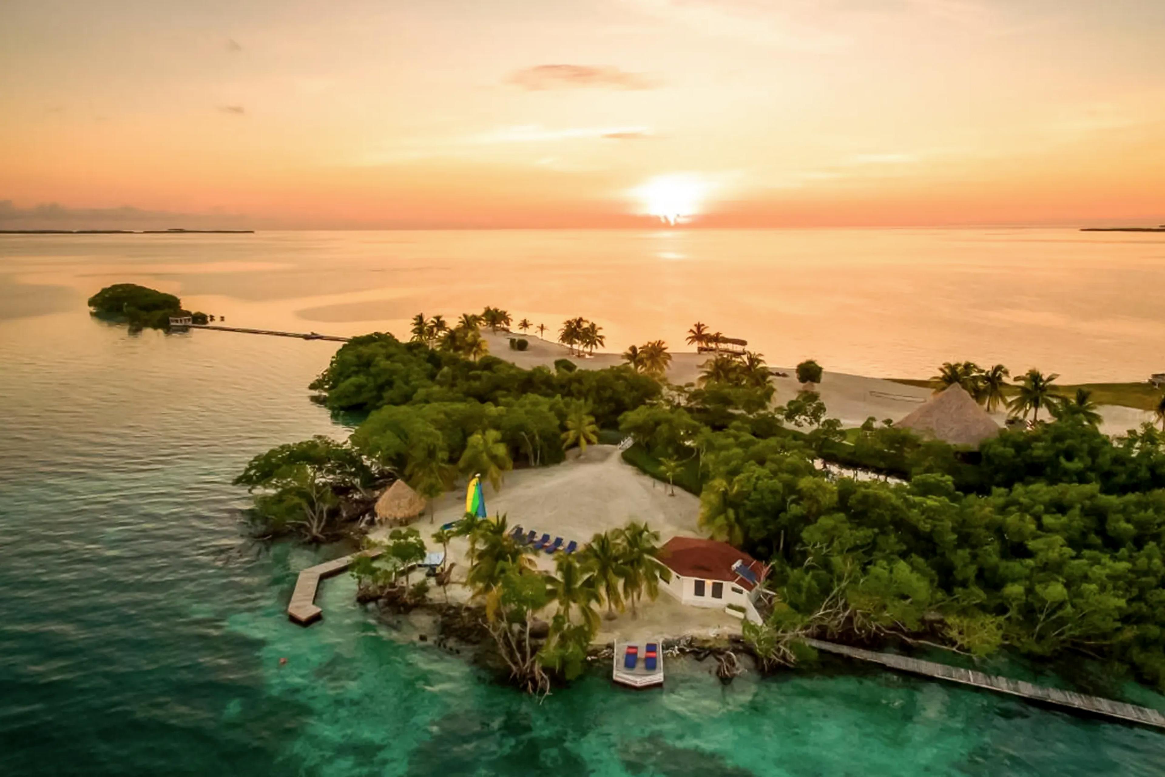 TRANSITION TO AMBERGRIS CAYE