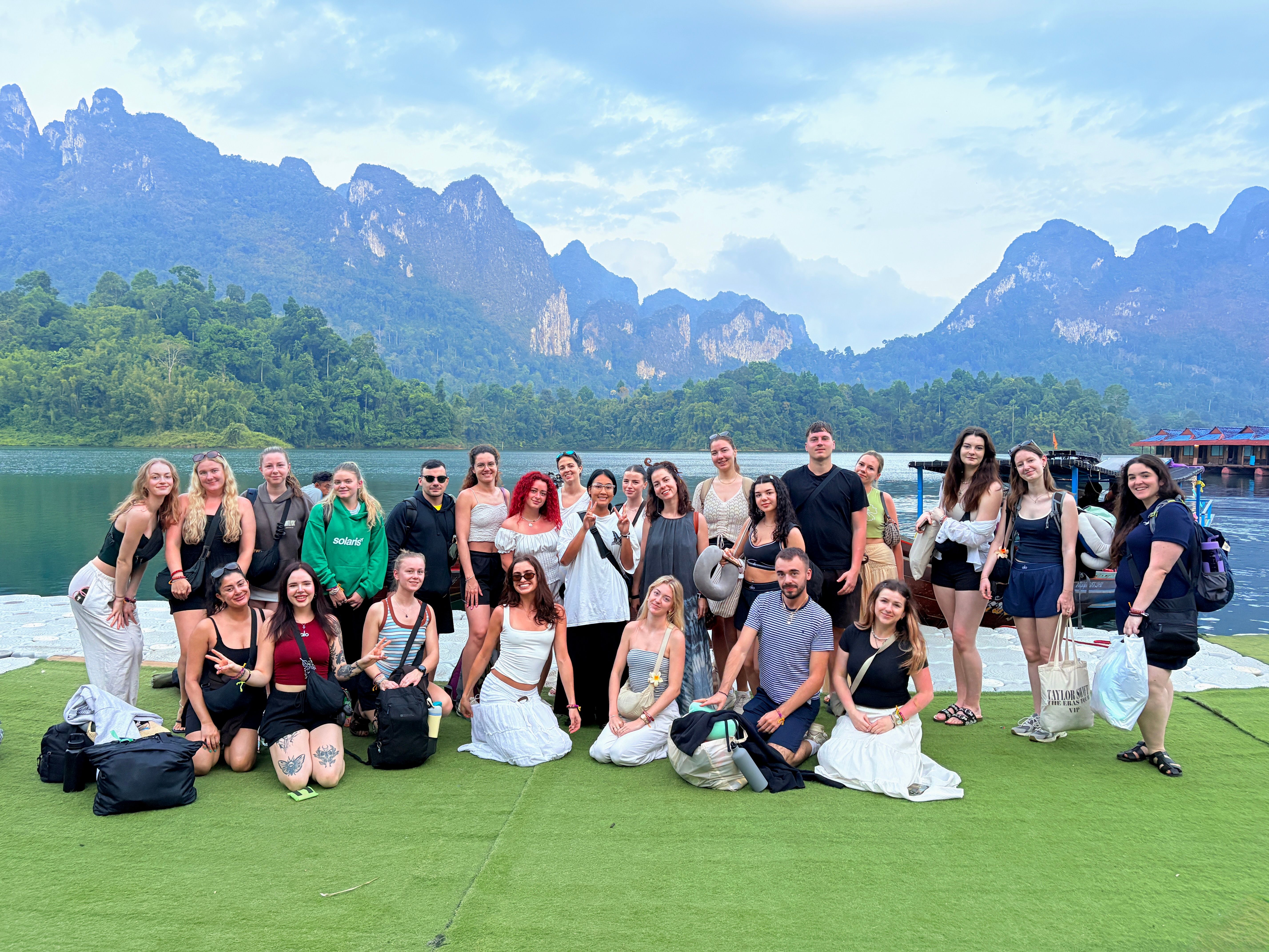group laying on the beach