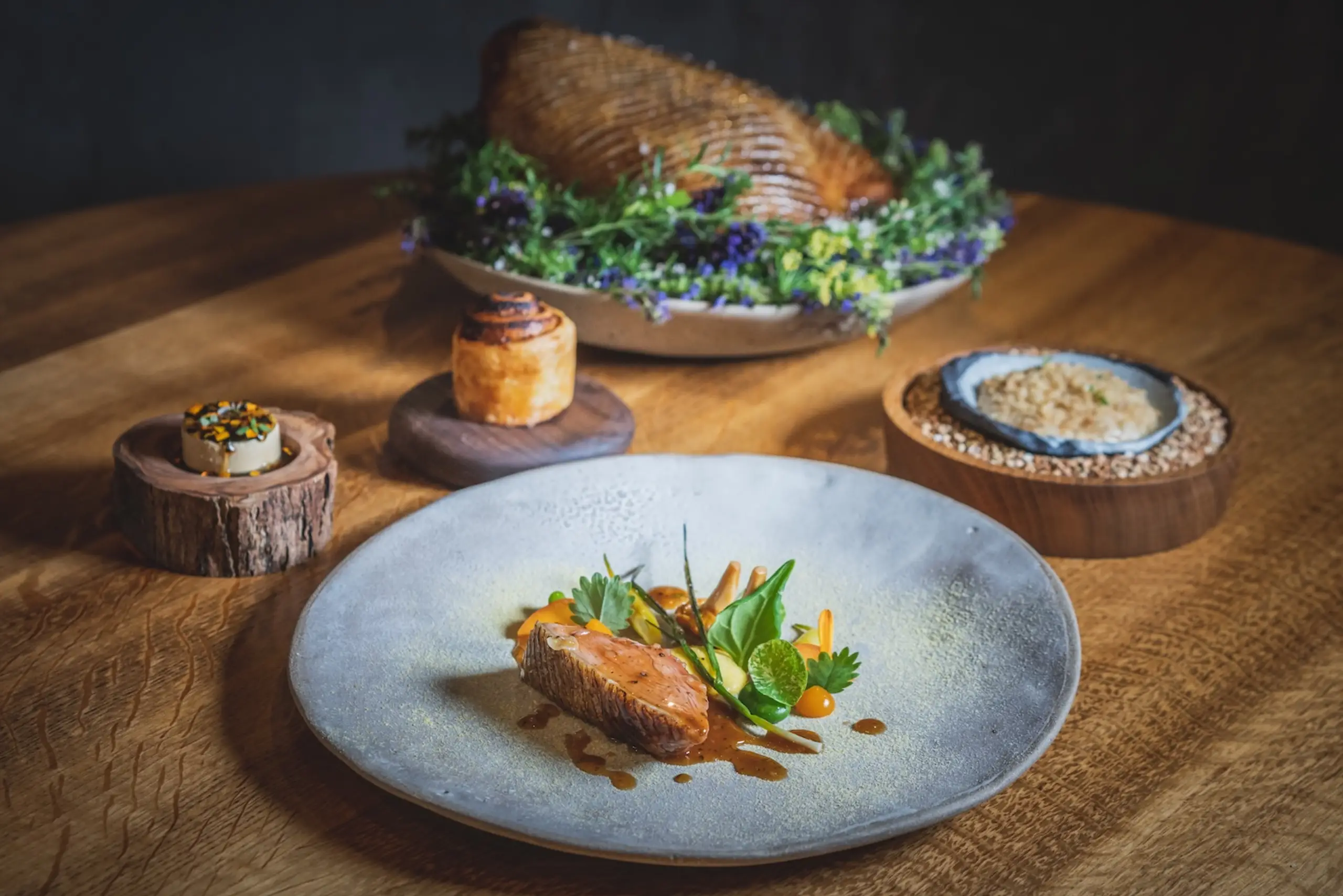 Honey roast Sladesdown duck with girolles, sweetcorn and beans, plated at Moor Hall.