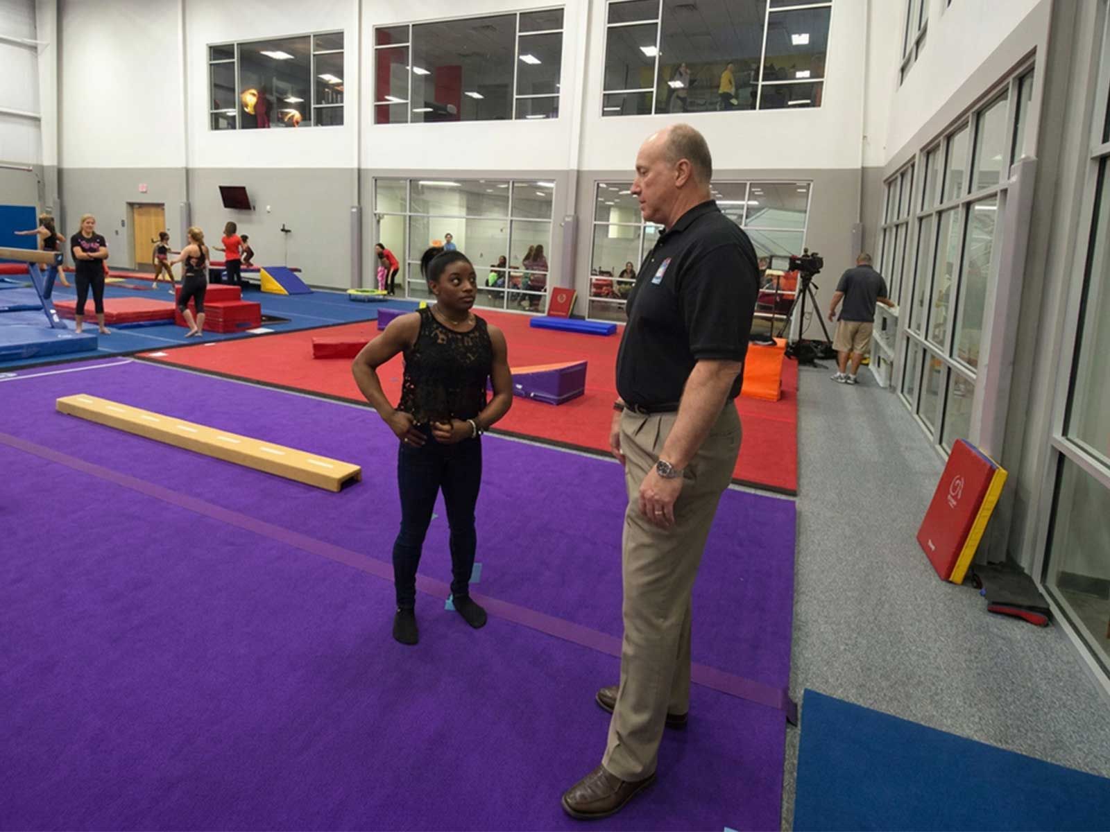 Robert Andrews and Simone Biles