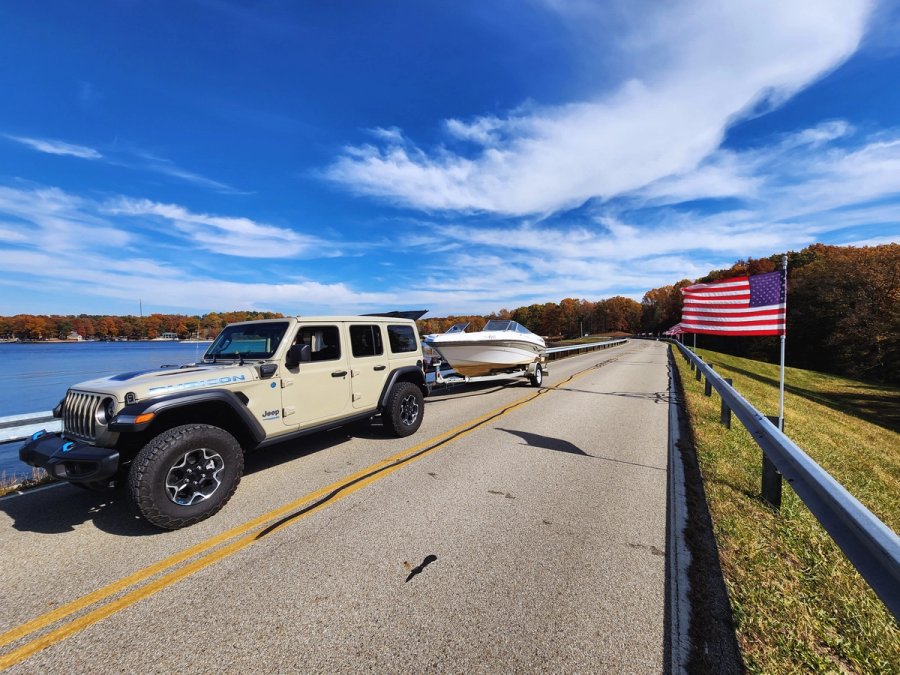 wrangler towing boat on dam