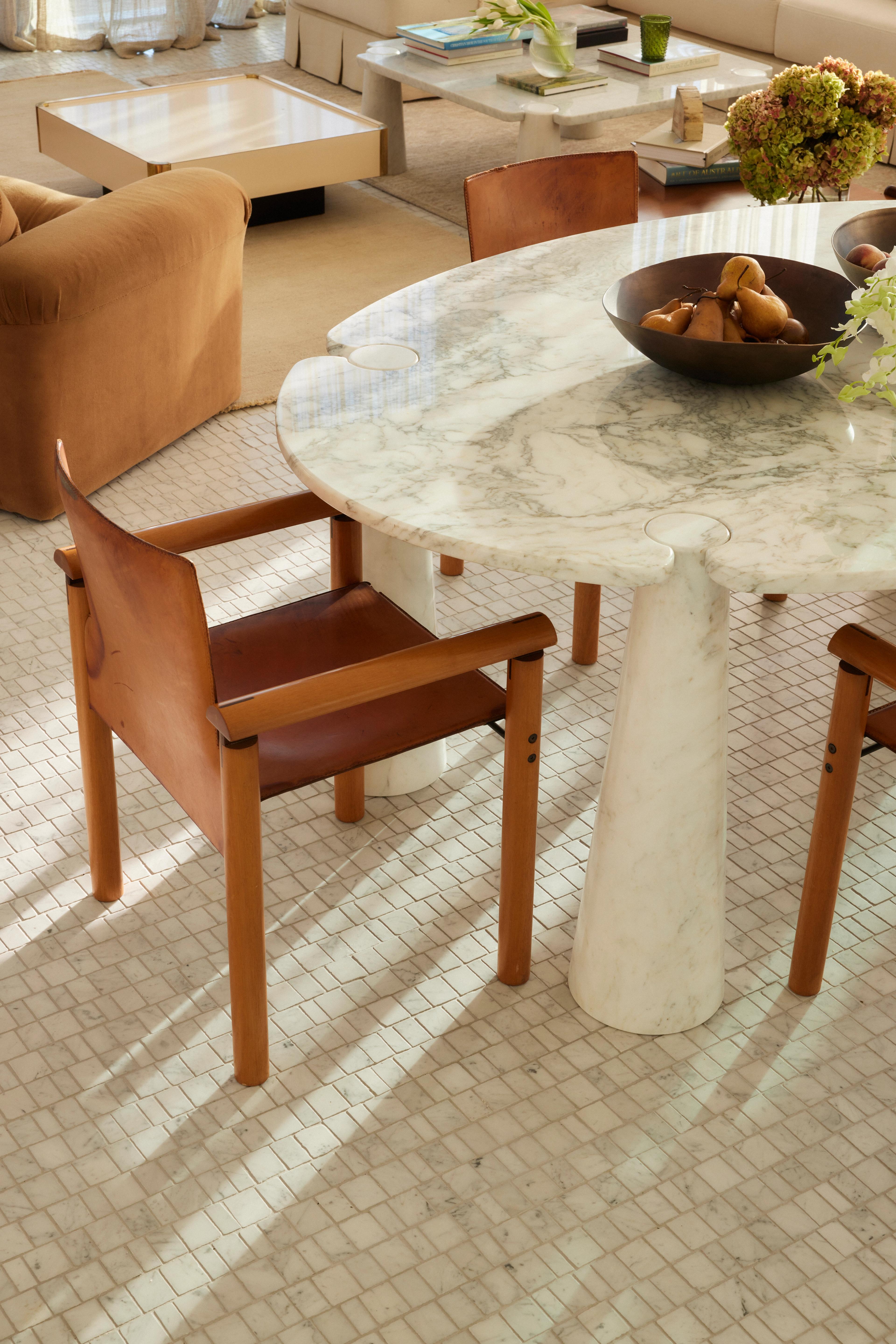Detailed photograph of dining table chair and marble dining table