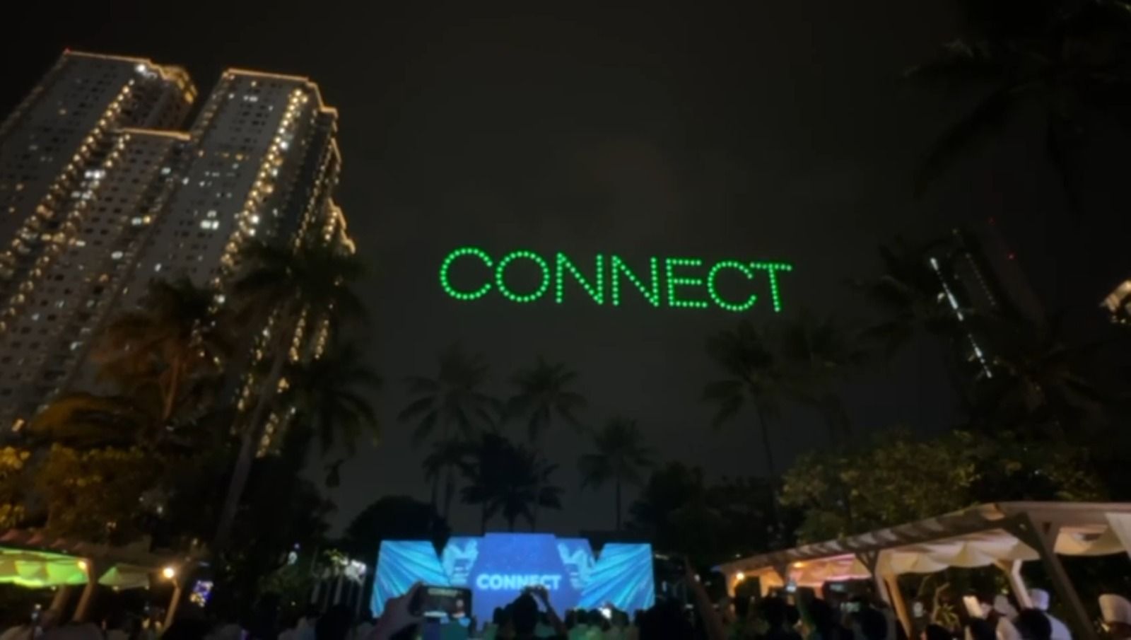 150 drones form the word CONNECT in green lights above Shangrila Hotel Jakarta during Pertamina Lubricant National Distributor Summit 2026