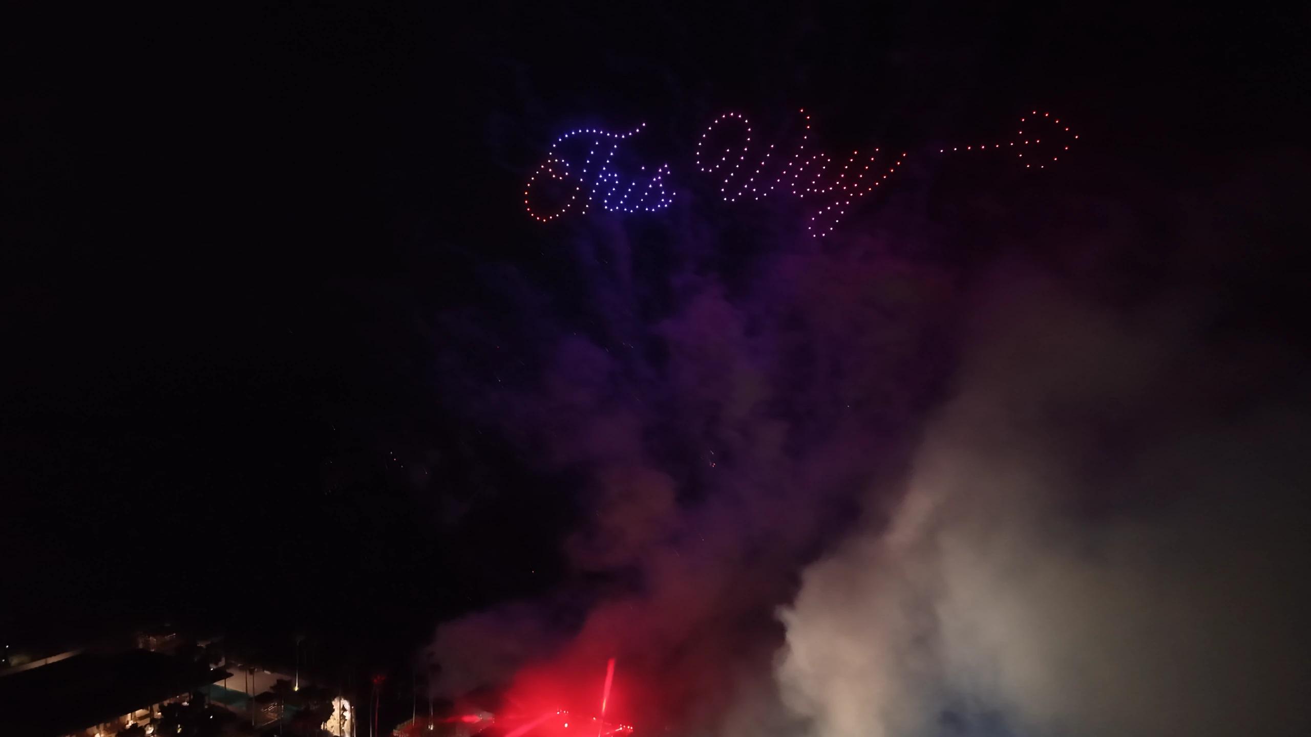 The Way lettering and an arrow in the Christina and Andrew wedding drone show at Alila Villas Uluwatu.