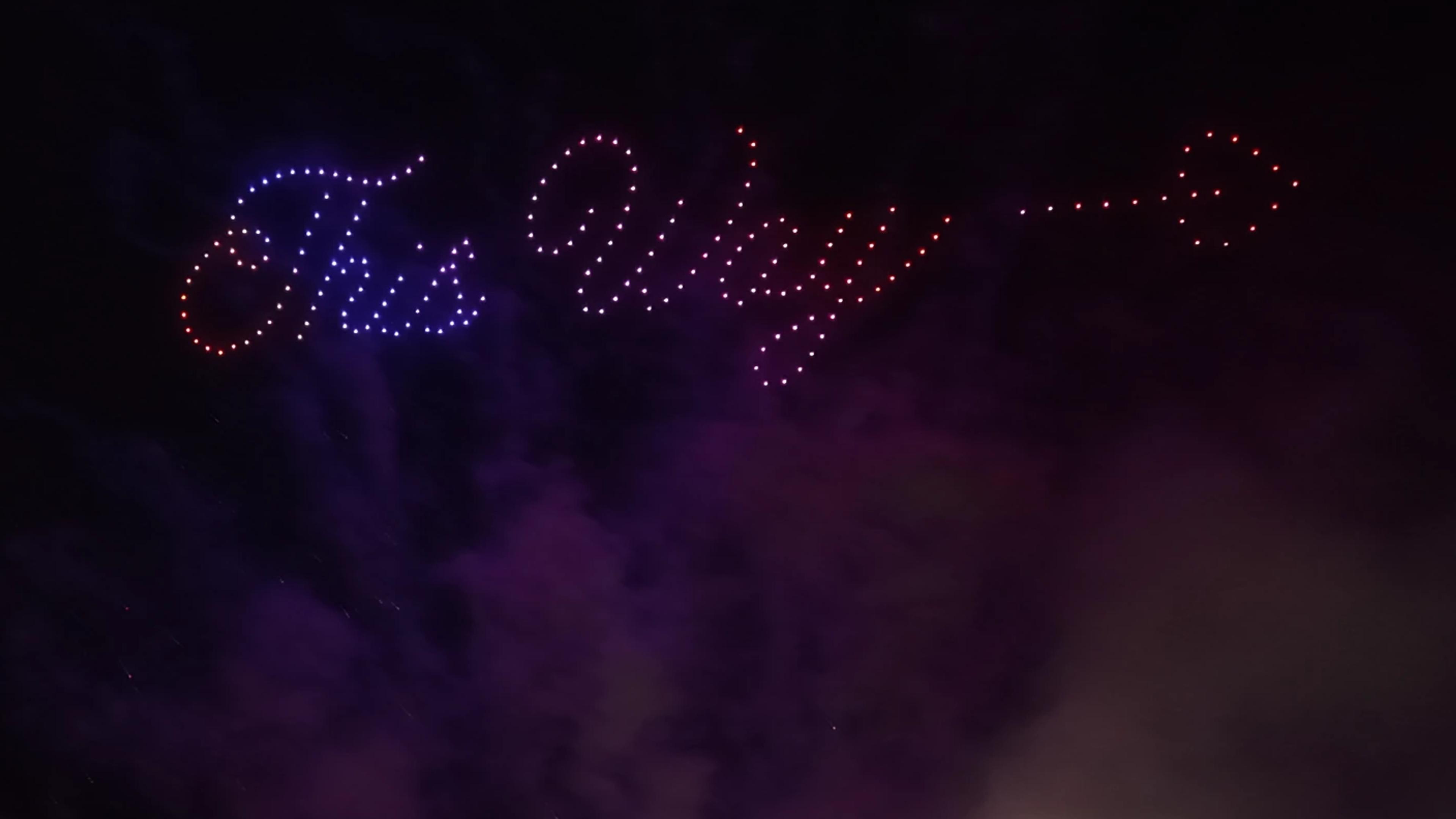 The Way lettering and an arrow in the Christina and Andrew wedding drone show at Alila Villas Uluwatu.