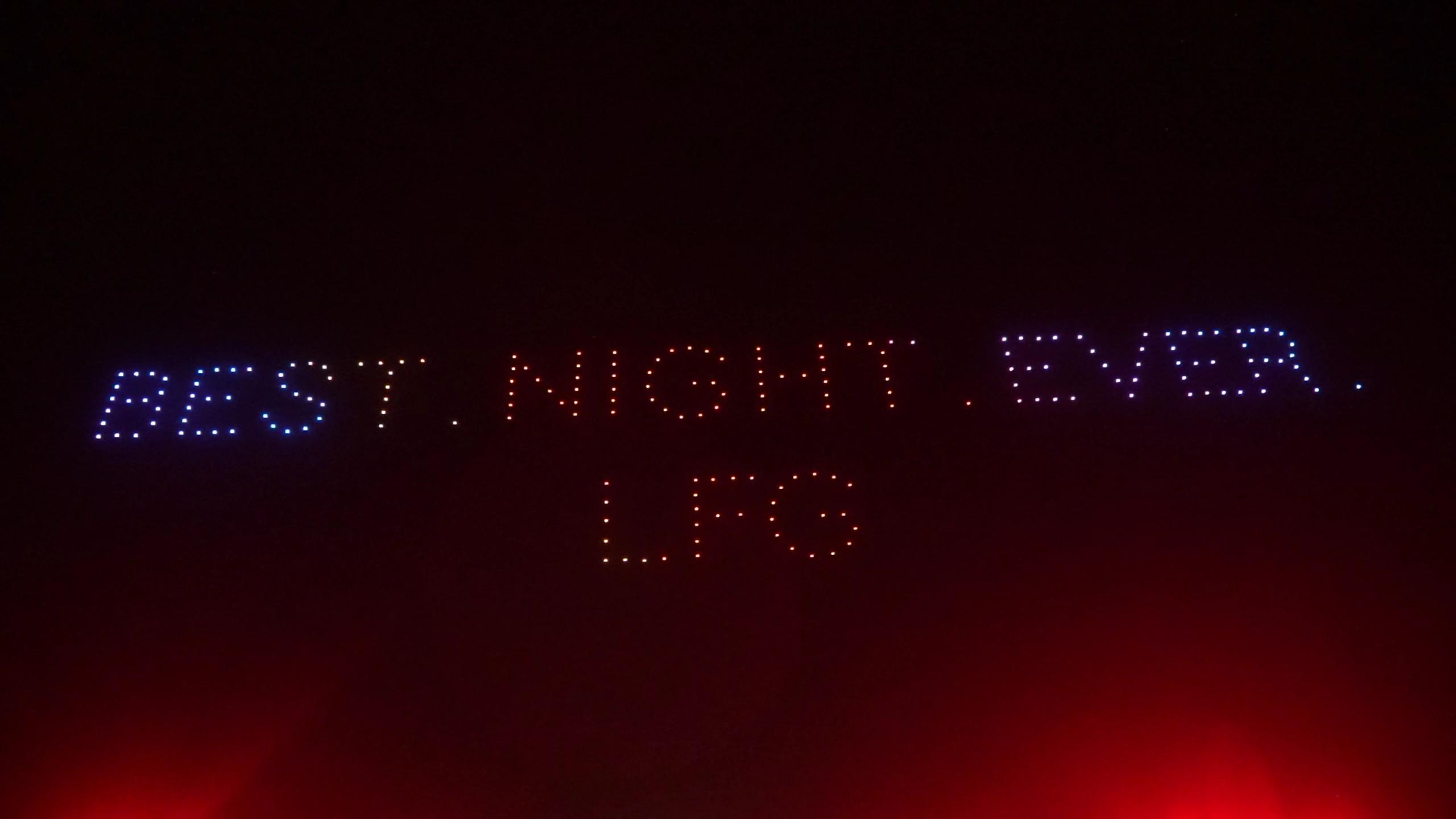 Best Night Ever and LFG written in drone lights at the Christina and Andrew wedding in Bali.