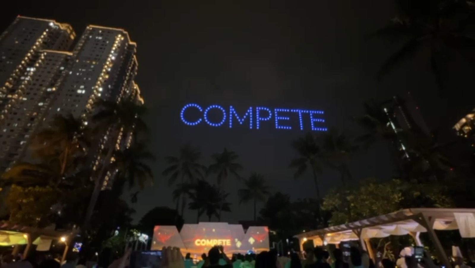 150 drones spell COMPETE in bold blue letters over Shangrila Hotel Jakarta at the Pertamina Lubricant National Distributor Summit 2026