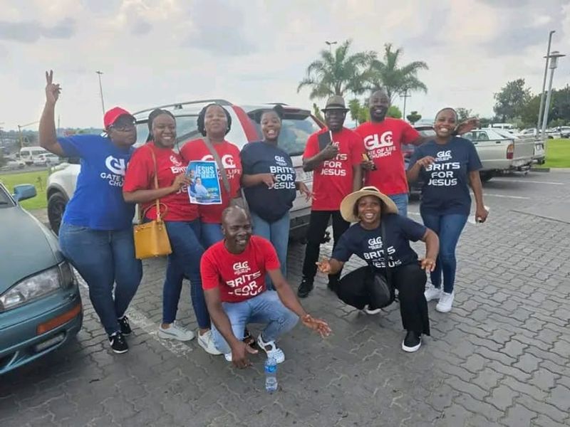 Gate of Life Church volunteers pose after donating clothes and providing support to Cosmo City residents.