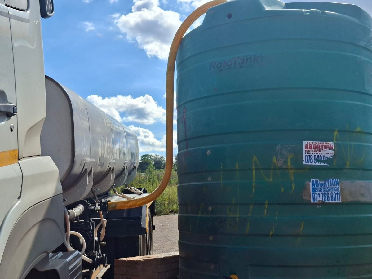Marikana Community Urged to Stop Dumping Waste Near Water Tank