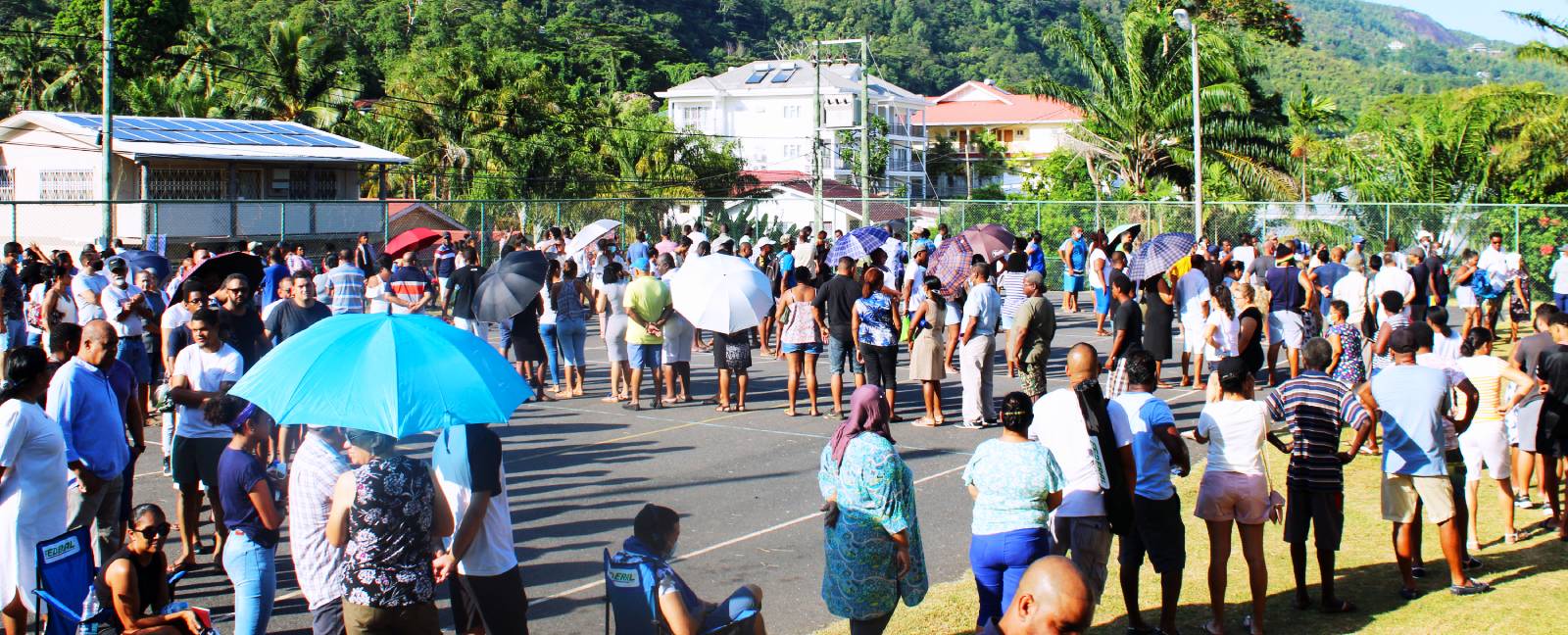 Voters queue at a polling station on the main Island of the Seychelles, on October 24, 2020